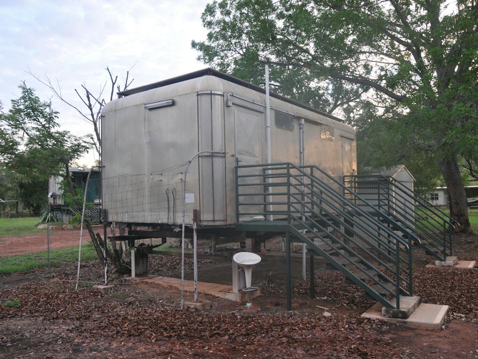 Ablution caravan (20 ft.) in the school quadrangle.
