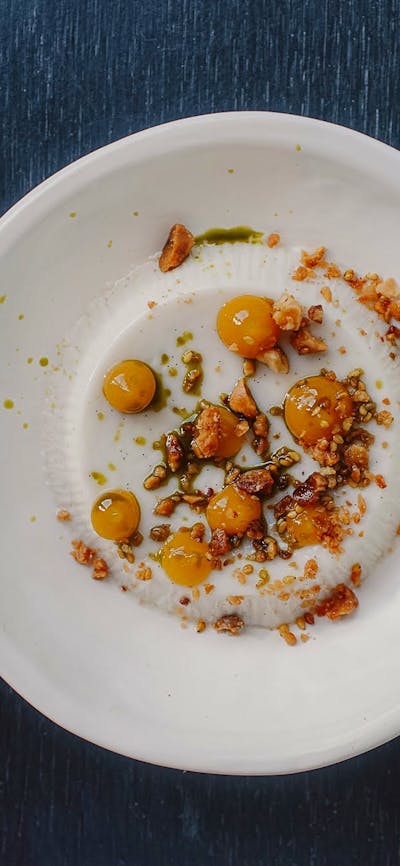 Coconut pannacotta, Geraldton wax, macadamia, yuzu sesame