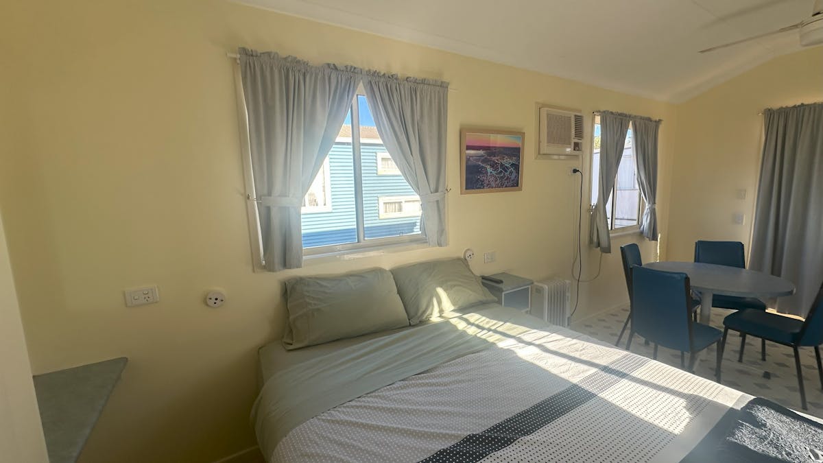 Spacious room with a double and two bunks
