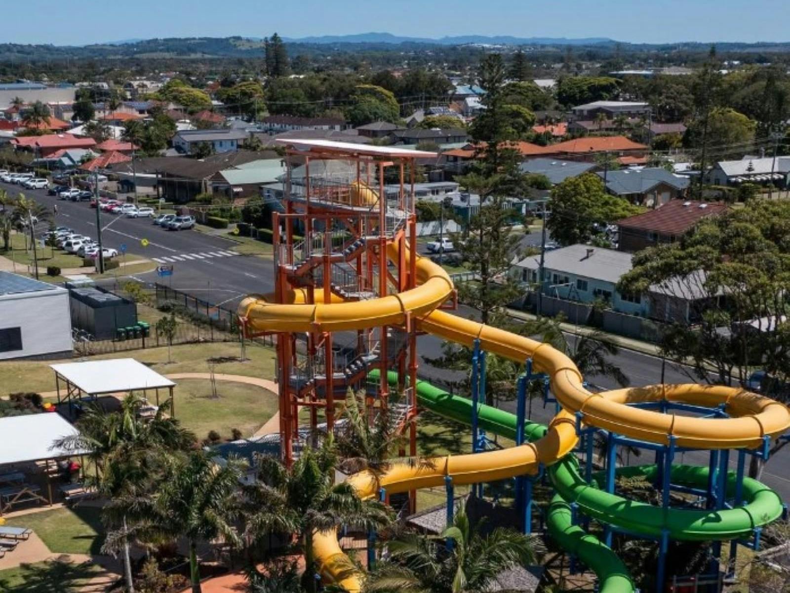Aerial shot of the waterslides with the main street located behind it