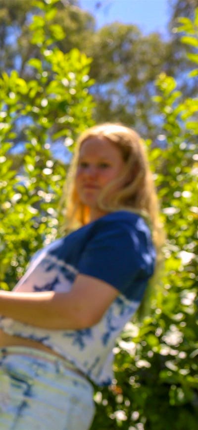 Girl picking berries at Clyde River Berry Farm