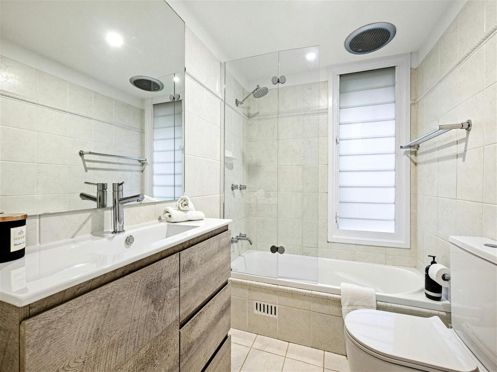 Stylish bathroom featuring a bathtub
