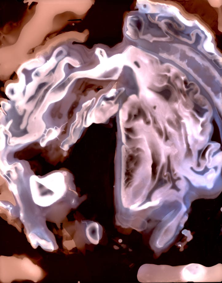 An abstract image of light pink squiggles