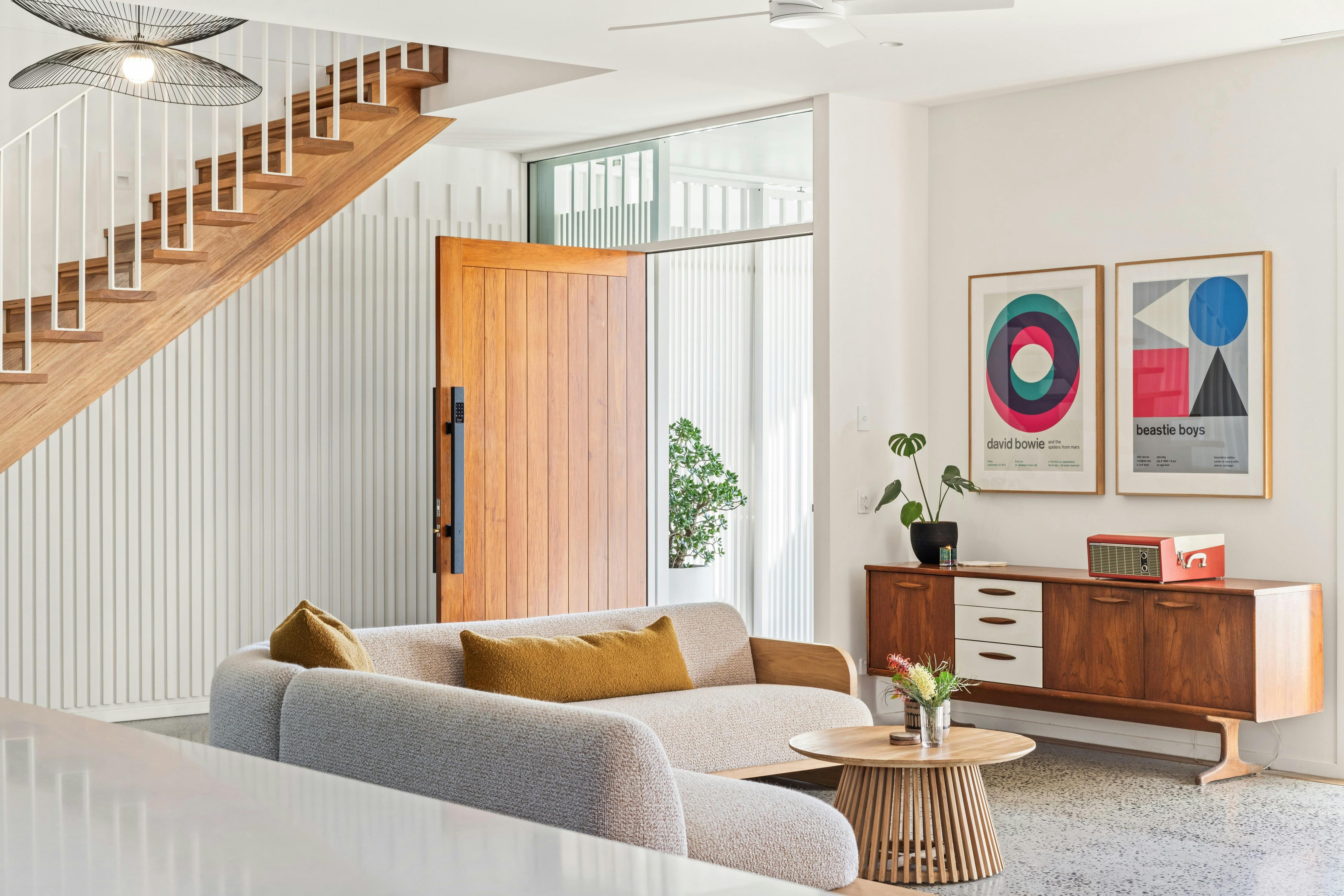 Living room and staircase at holiday home Seasalt