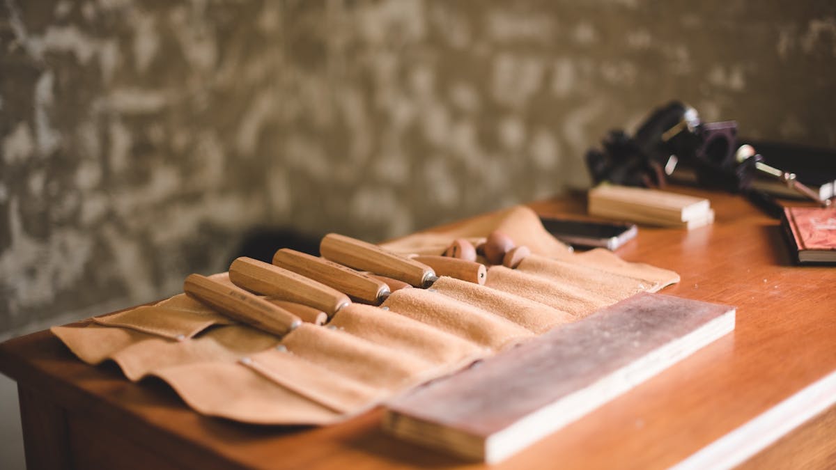 Wood carving tools rest on workbench at The Churn Room Wood carving tools rest on workbench at The Churn Room