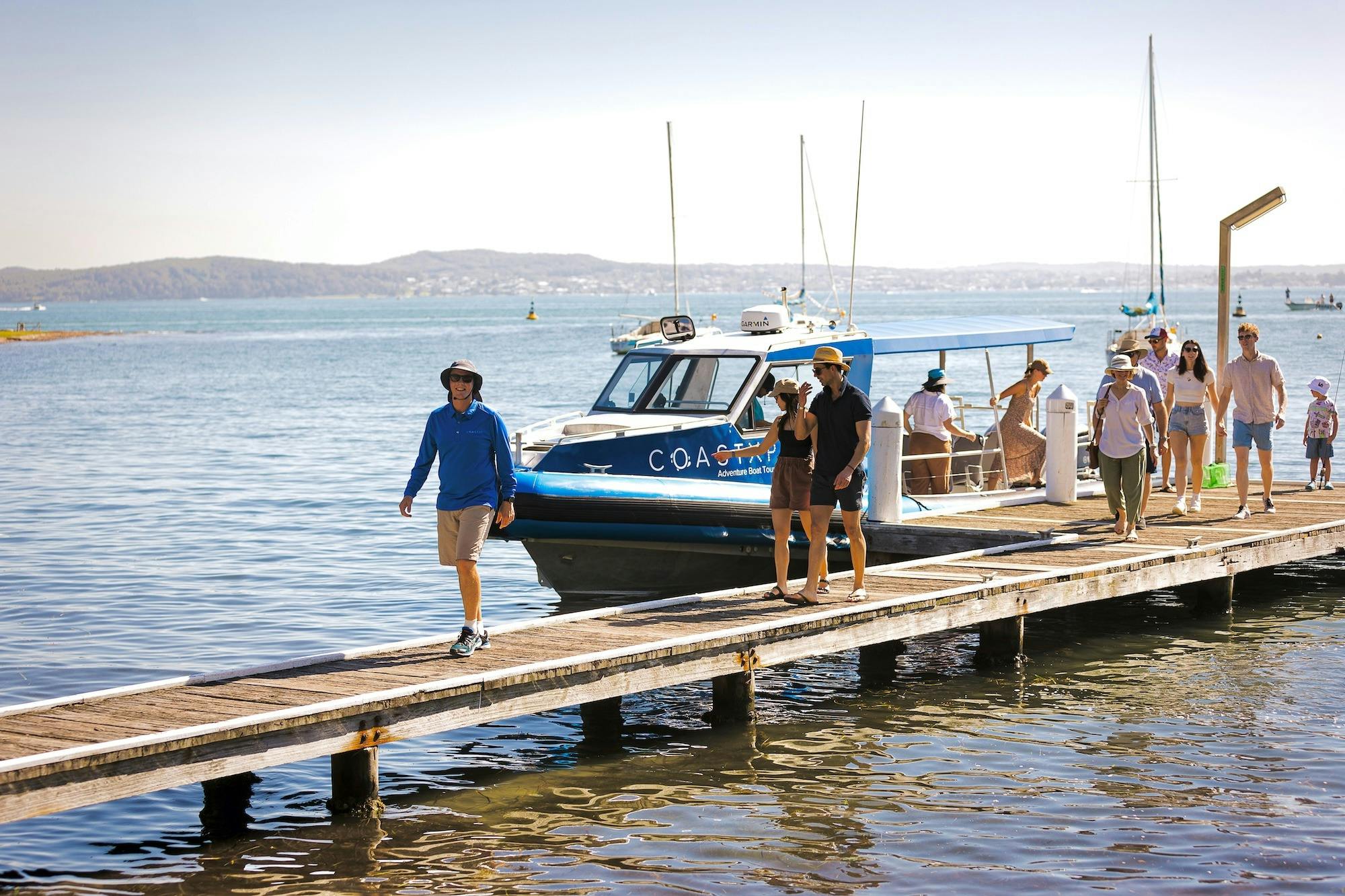 Passengers alighting from a boat tour