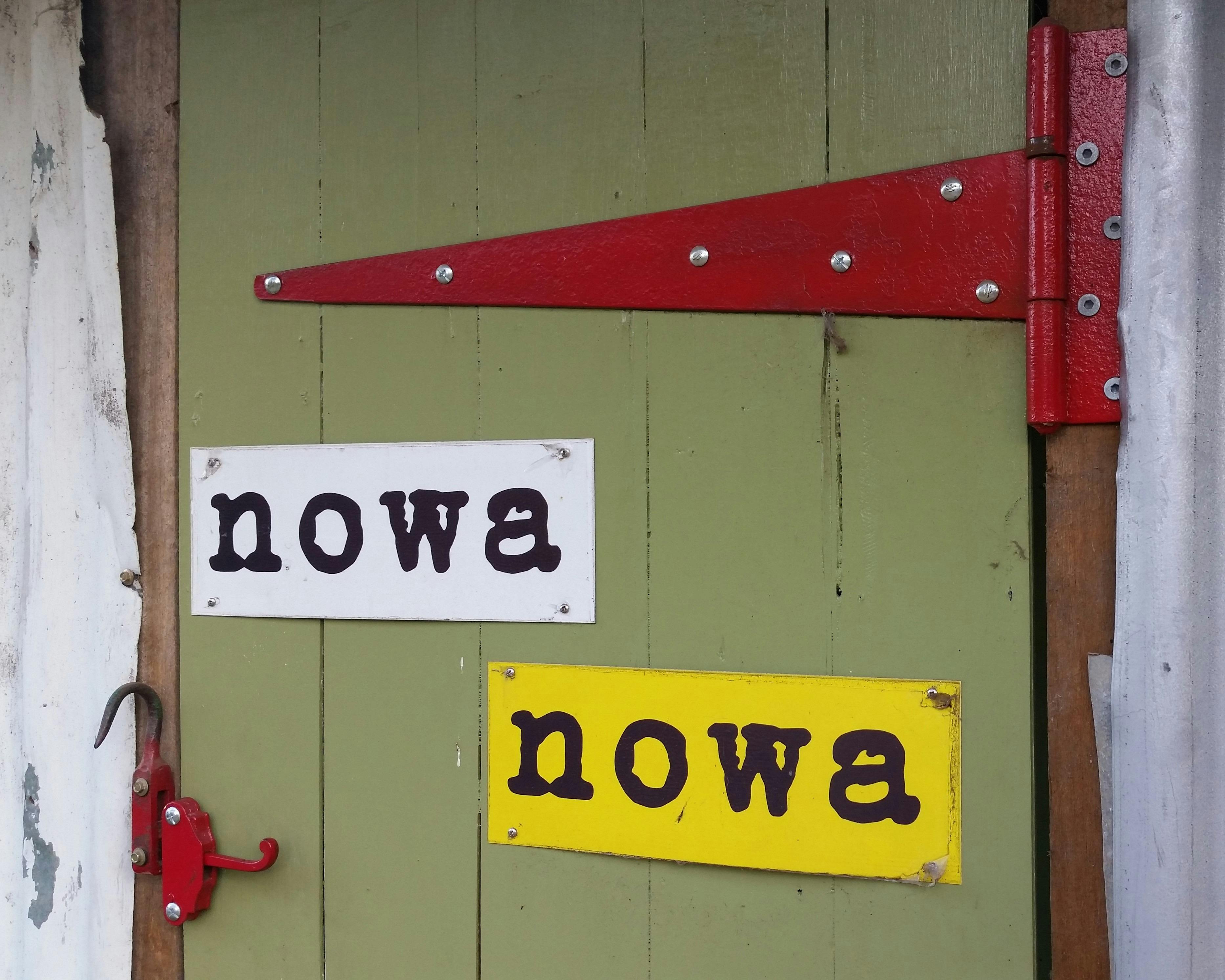 Door with nowa nowa written on it