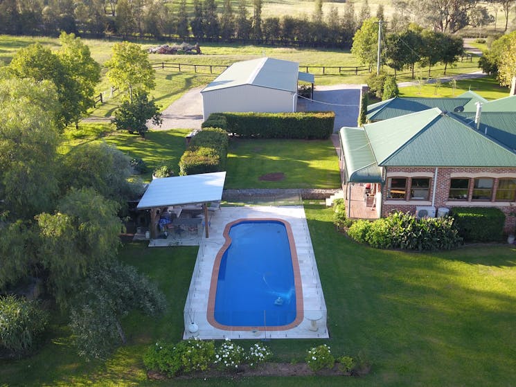 Looking from the South over the pool and homestead to the Farm Shed
