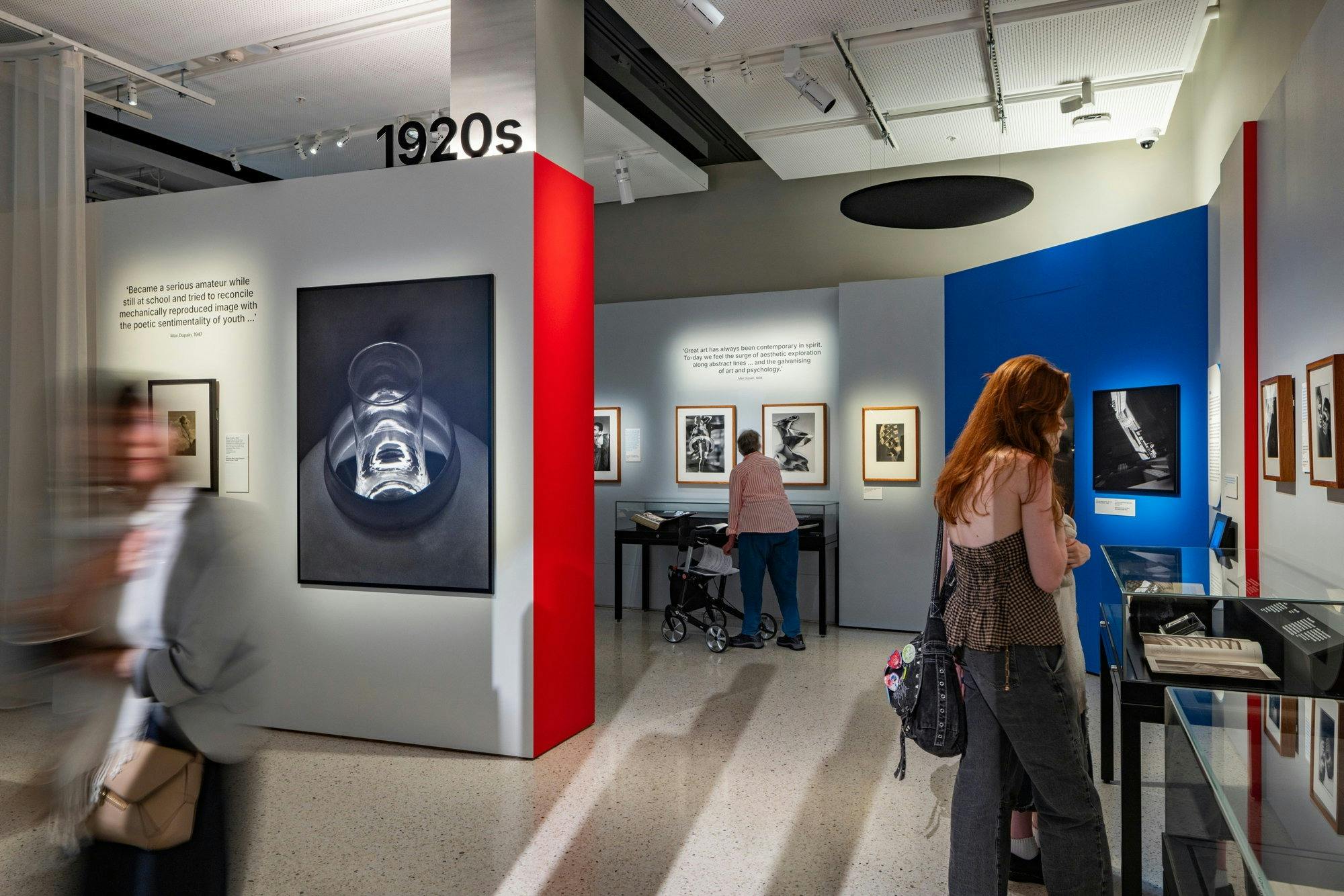 People in an exhibition space