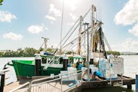 Fishing vessel unloading stock