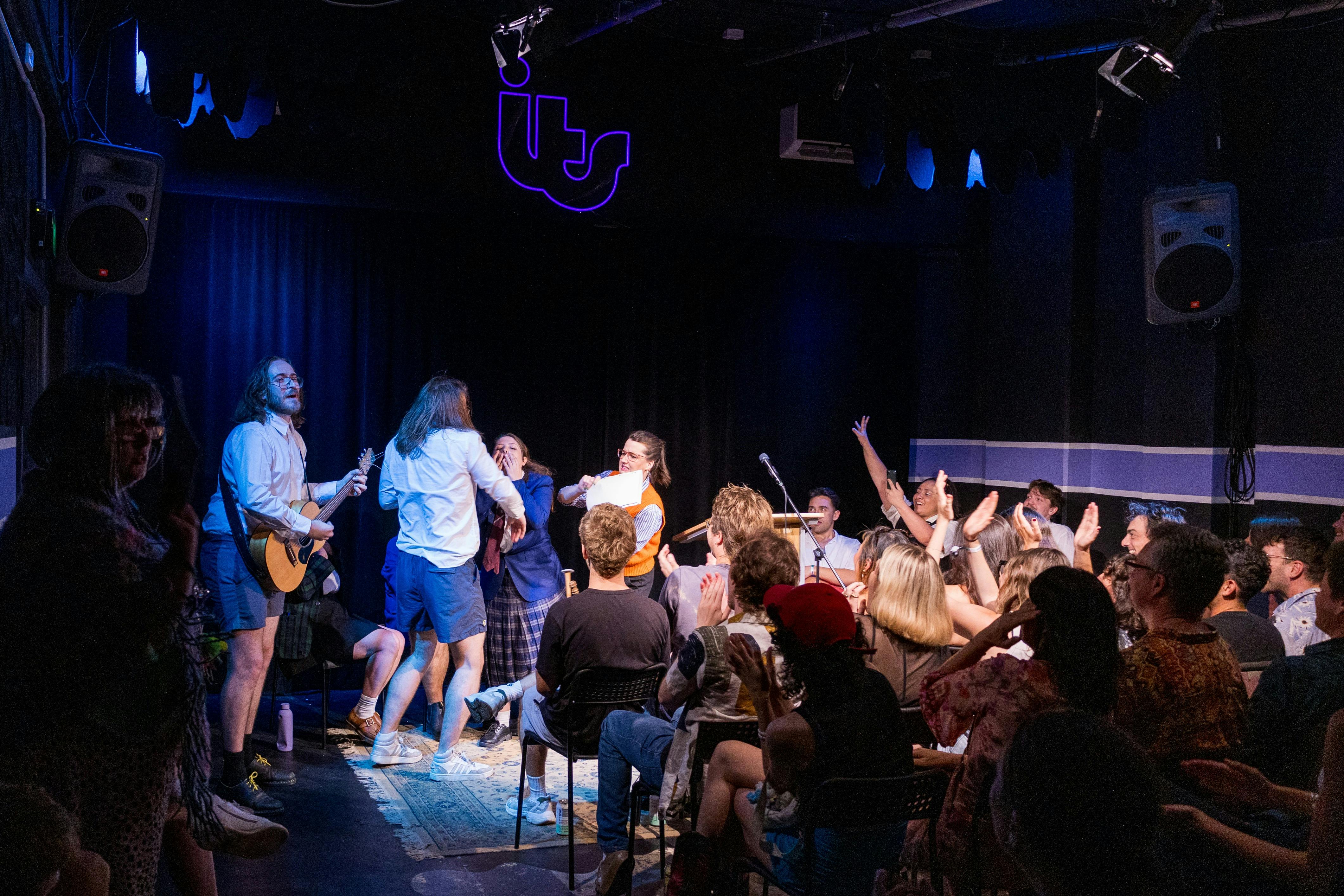 Chaotic improv show happening on stage