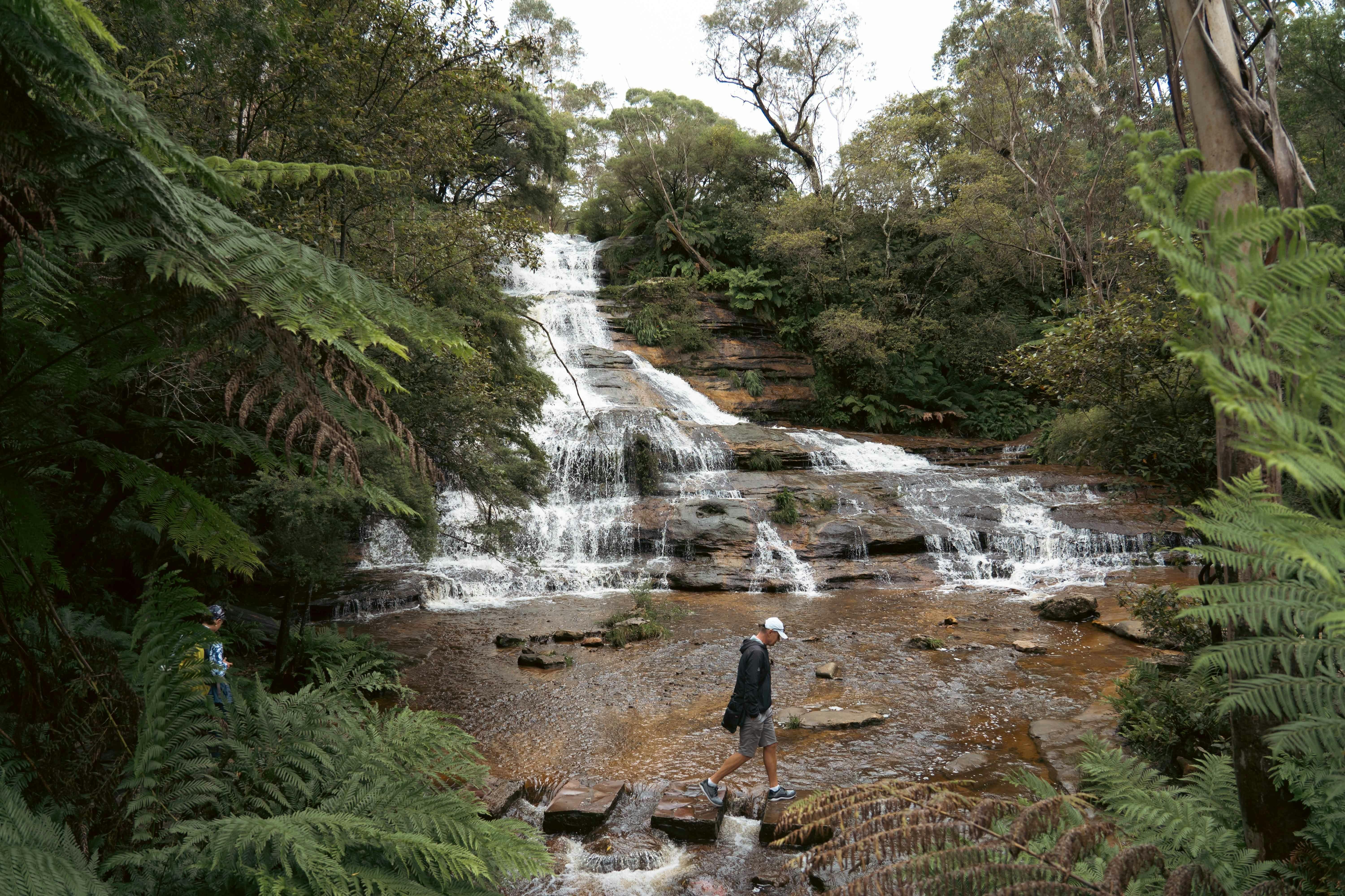 Walk on the stepping stones at the bottom of the amazing Katoomba Cascade Falls