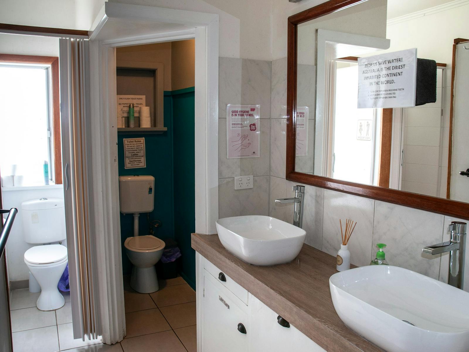 2 toilets, 2 showers, 2 sinks