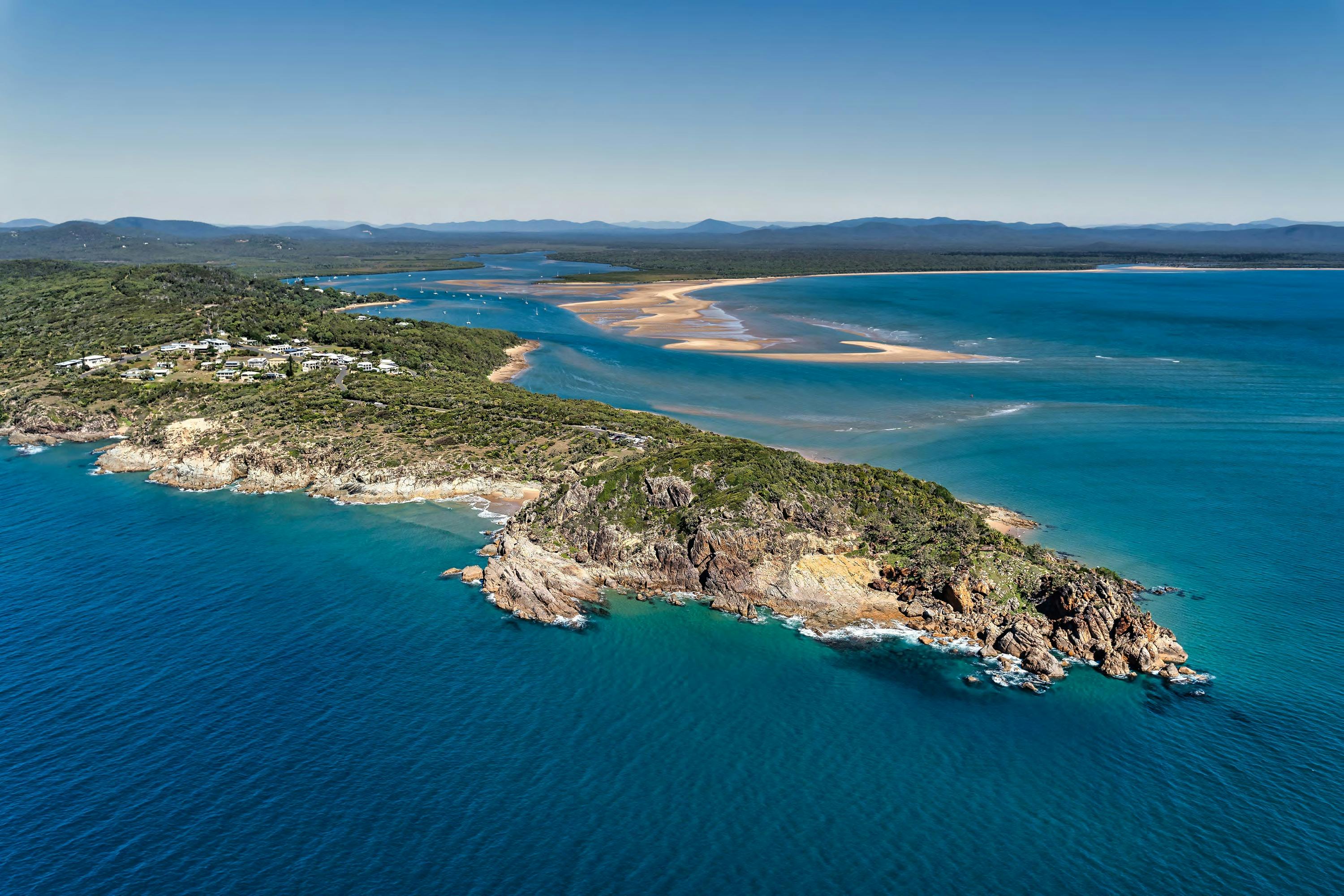 1770 stunning of Bustard heads Crystal blue sea and endless horizon, centred on the rocky headland