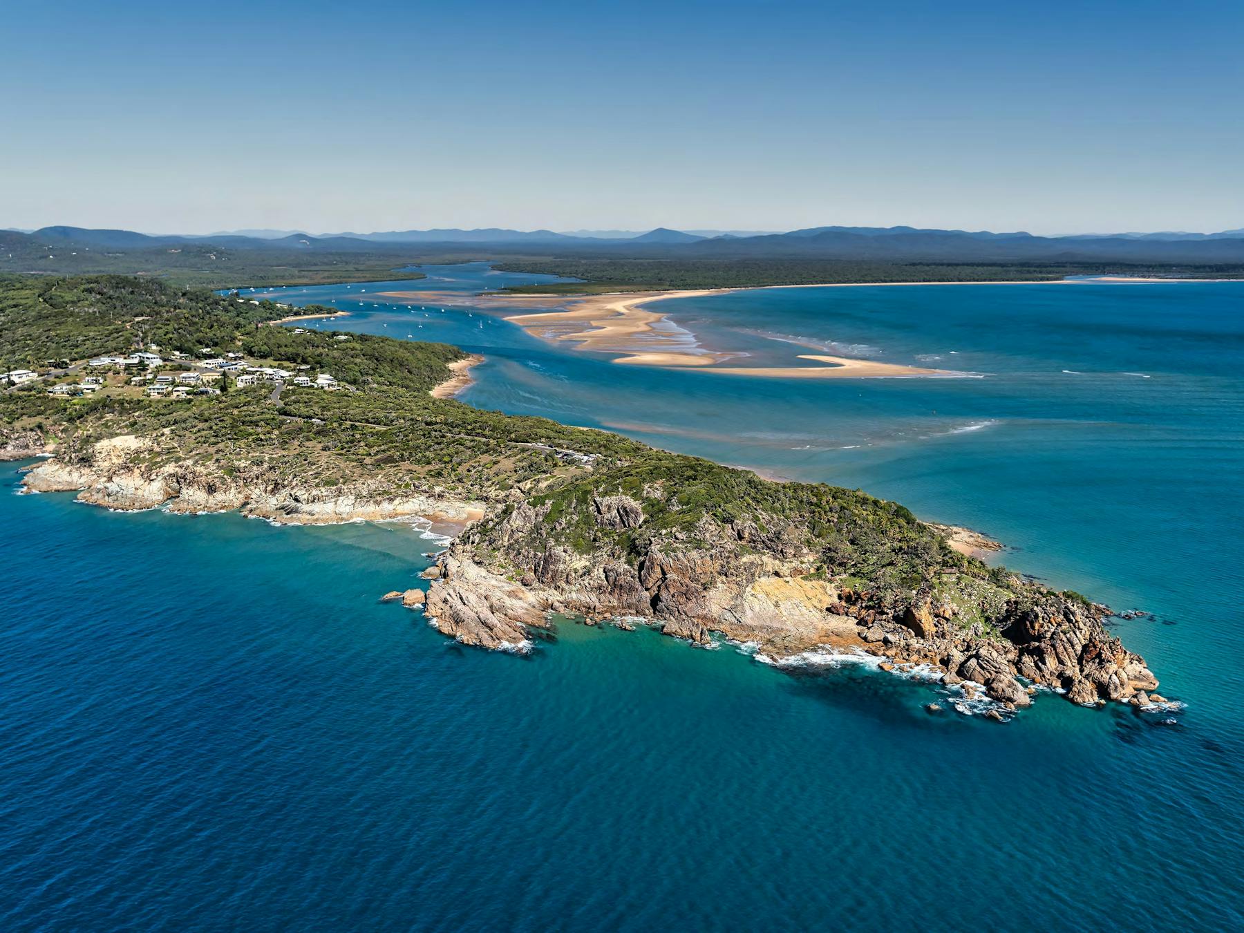 1770 stunning of Bustard heads Crystal blue sea and endless horizon, centred on the rocky headland