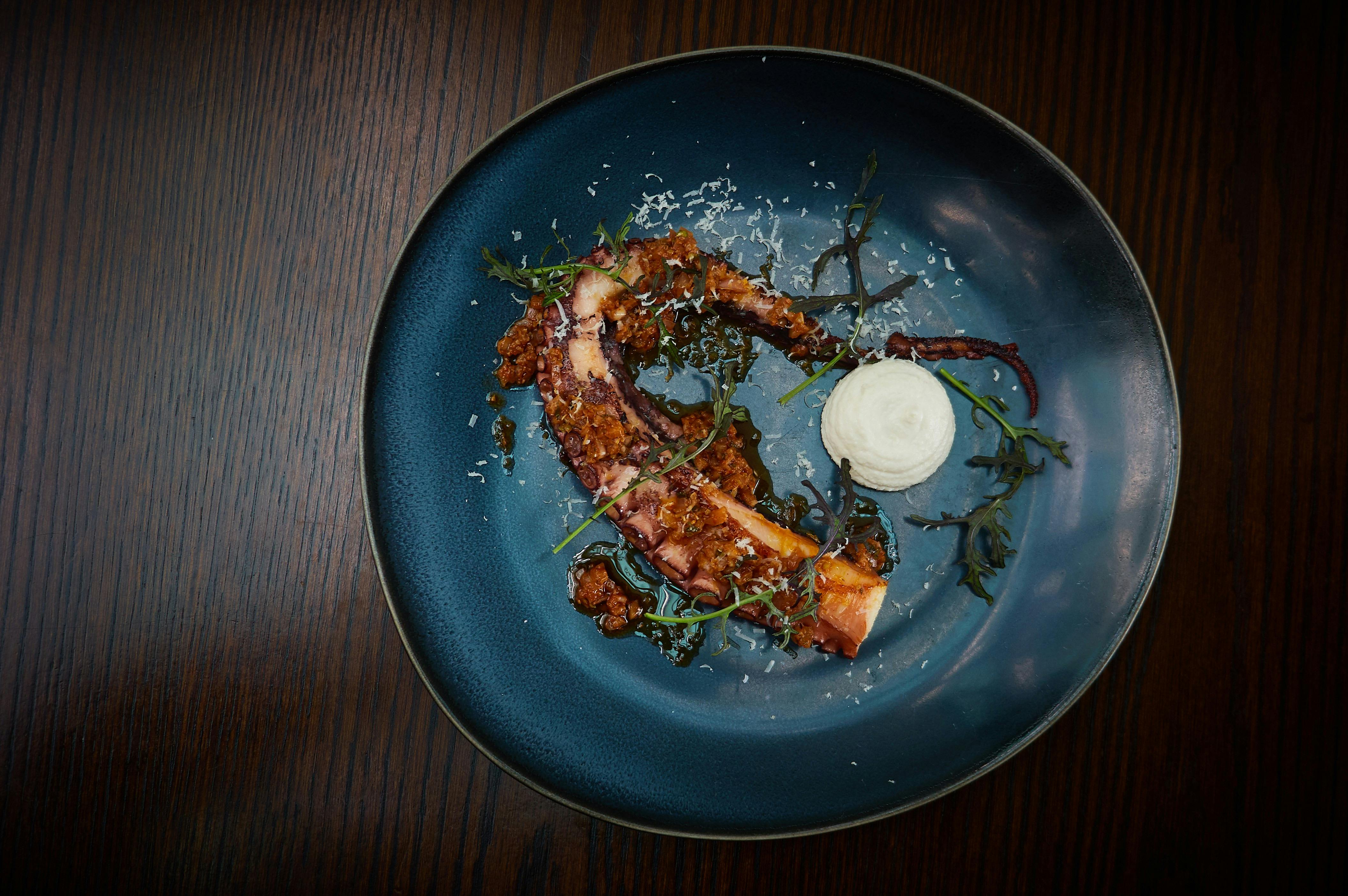 Octopus, almond cream, chermoula, red elk