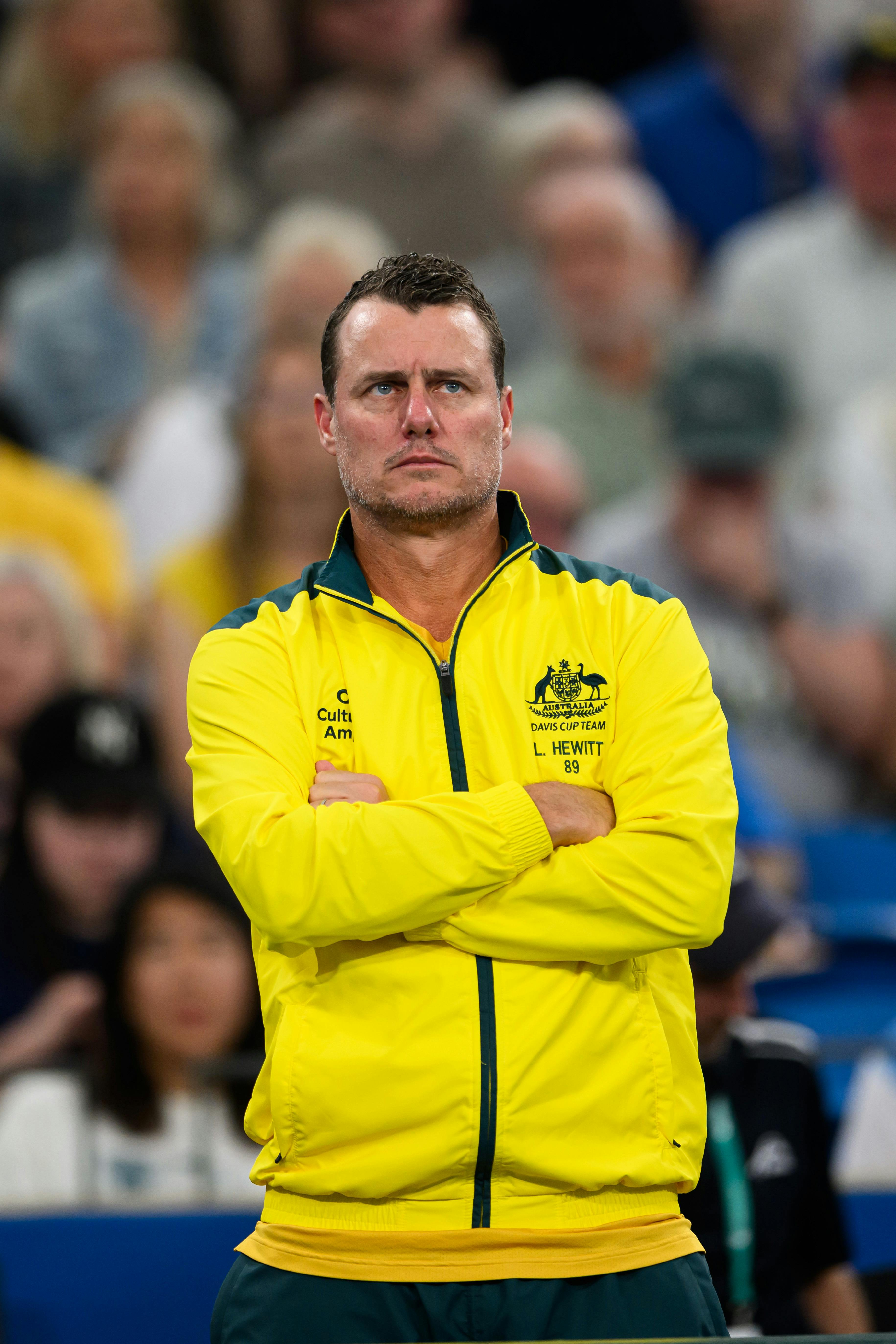 Lleyton Hewitt with his arm crossed (Captain of Team Australia)
