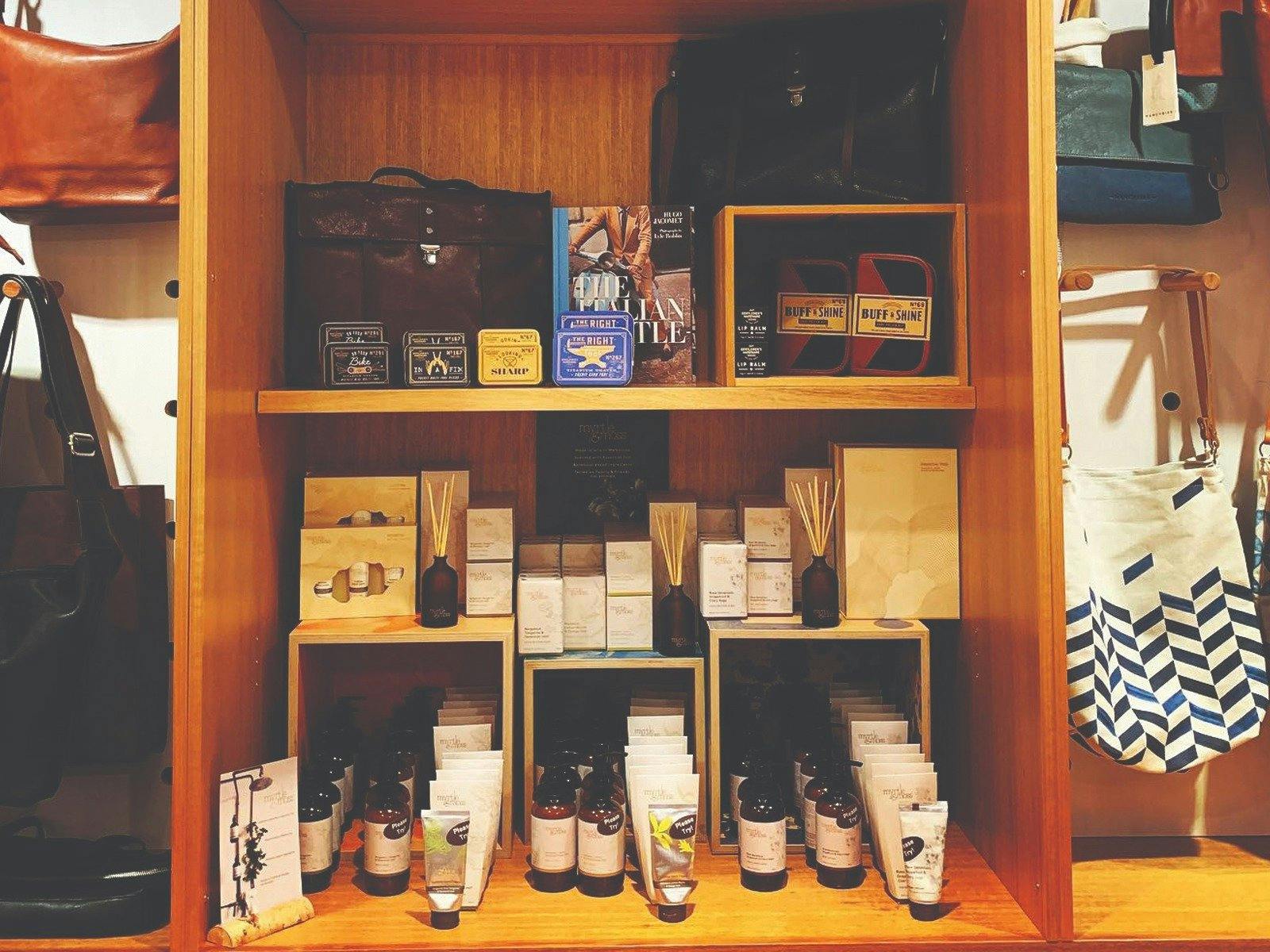 Shop Display including Myrtle and Moss hand creams, body products and reed diffusers; Men’s gifts