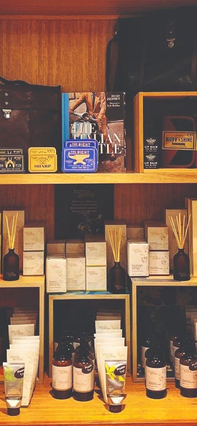 Shop Display including Myrtle and Moss hand creams, body products and reed diffusers; Men’s gifts