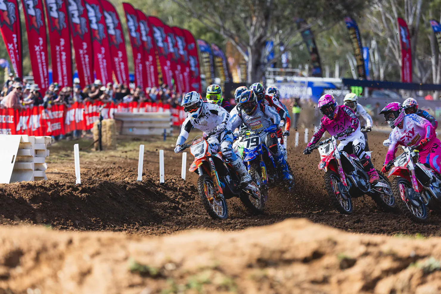 The MX1 Pack Hurtles Around Turn 1