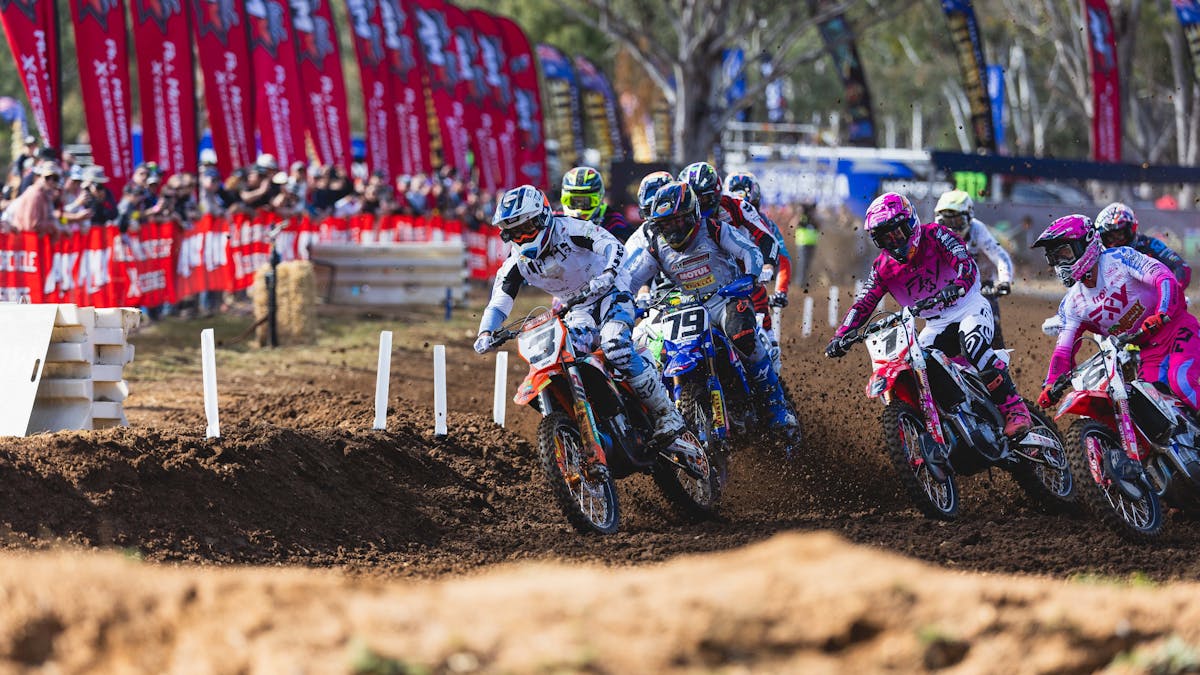 The MX1 Pack Hurtles Around Turn 1
