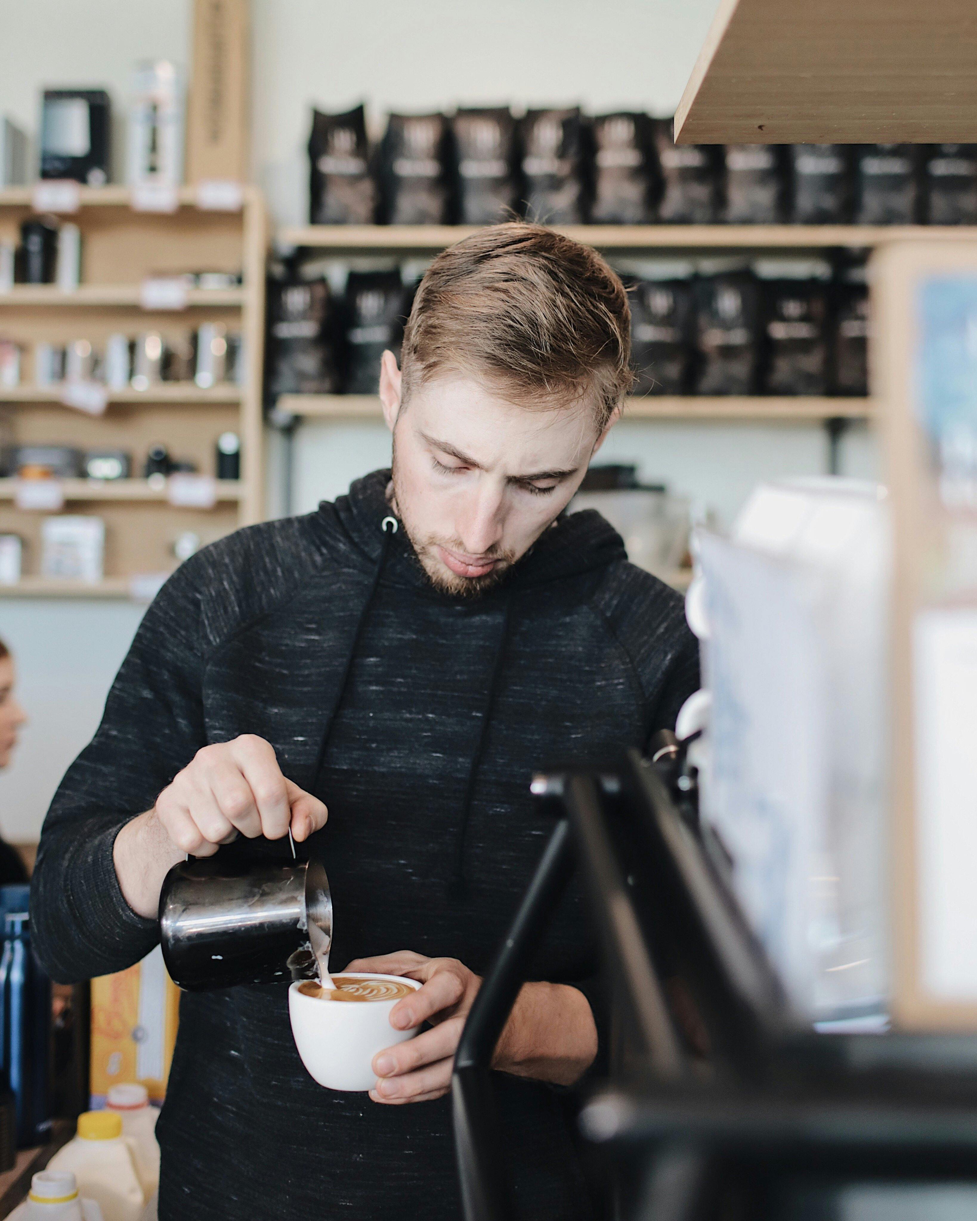Barista making coffee