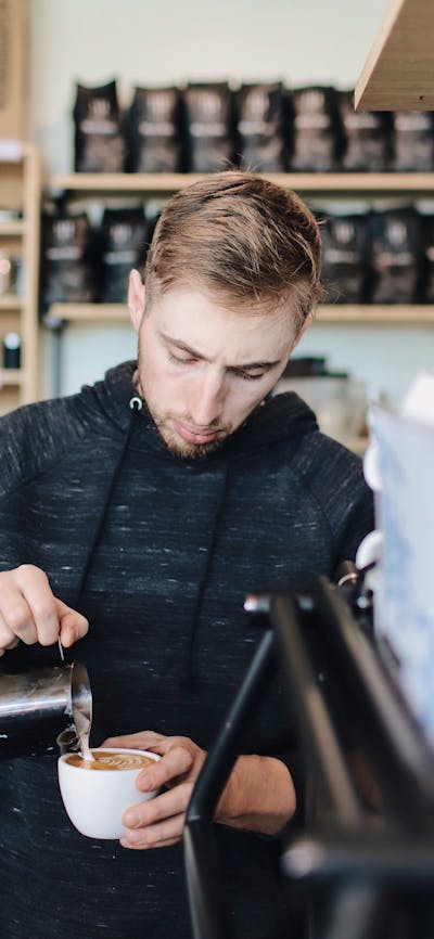 Barista making coffee