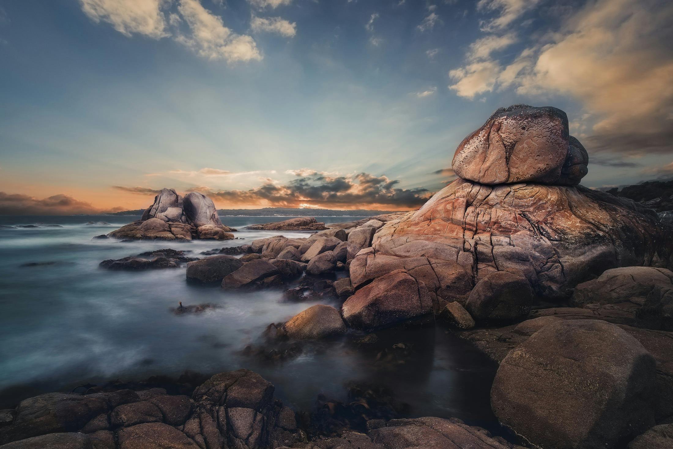 boulders standing proud on the wild Tasmanian coastline