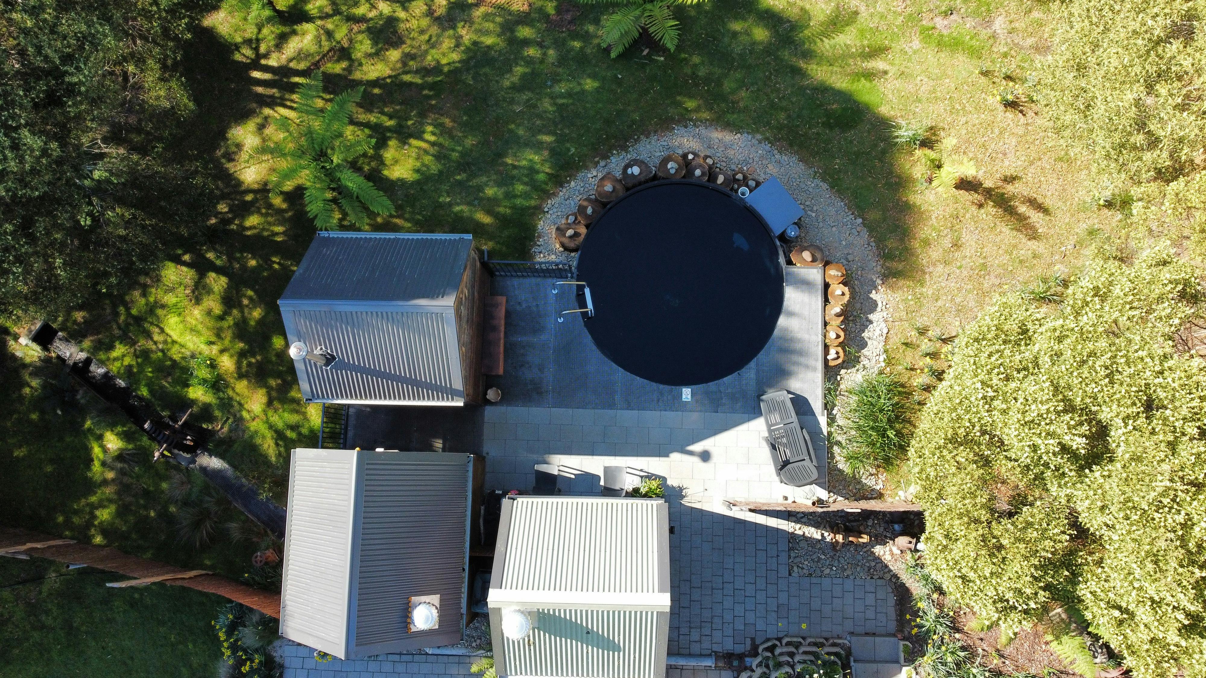 Aerial photo of the private wood-fired tailrace sauna near Derby, north east Tasmania