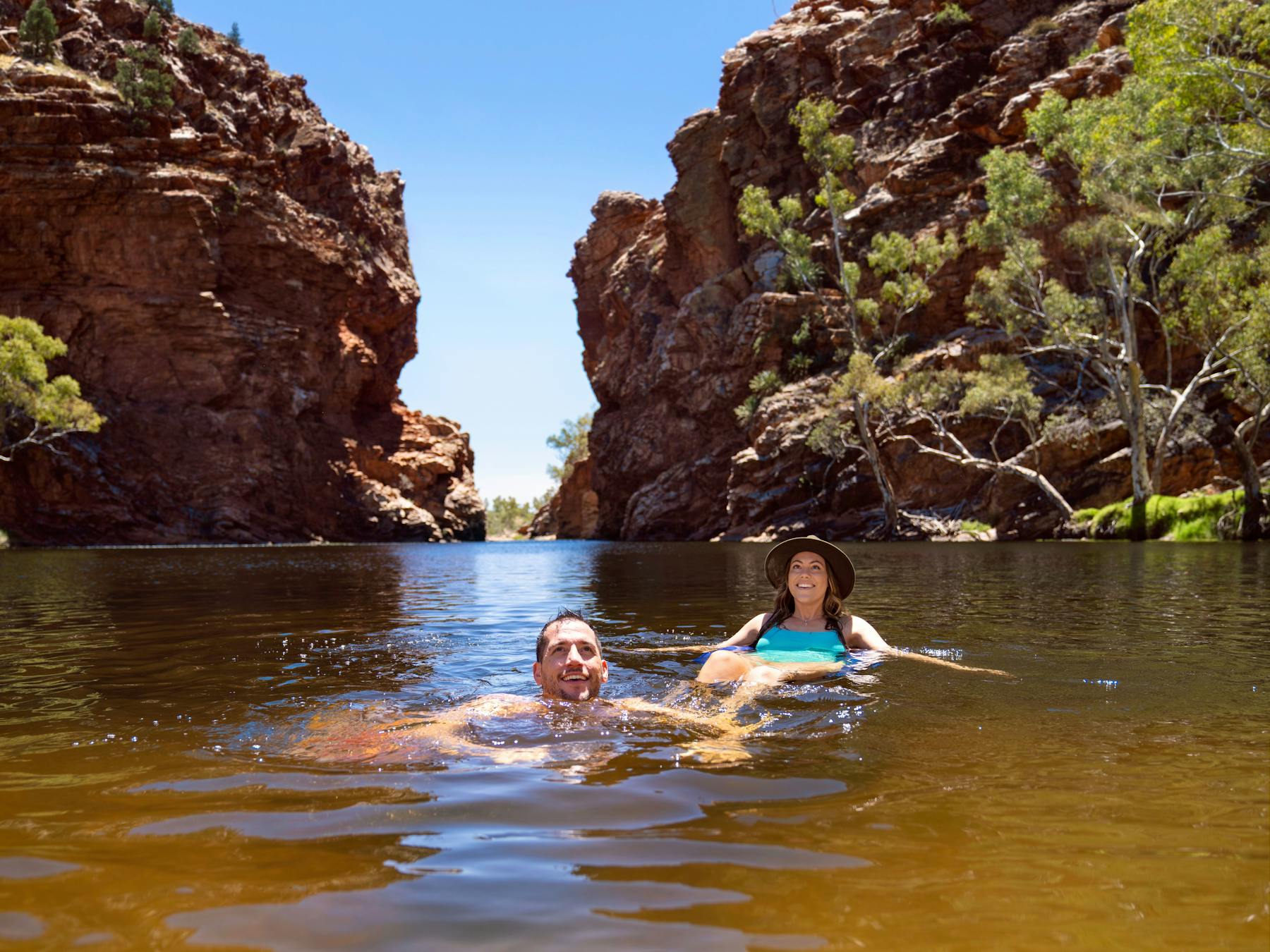 Couple swimming in Ellery Creek Big Hole