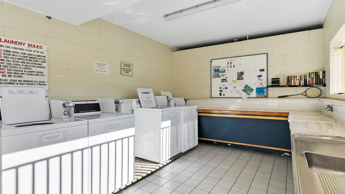 Bribie Island Caravan Park Guest Laundry, inlcuding folding area, washing machines and dryers