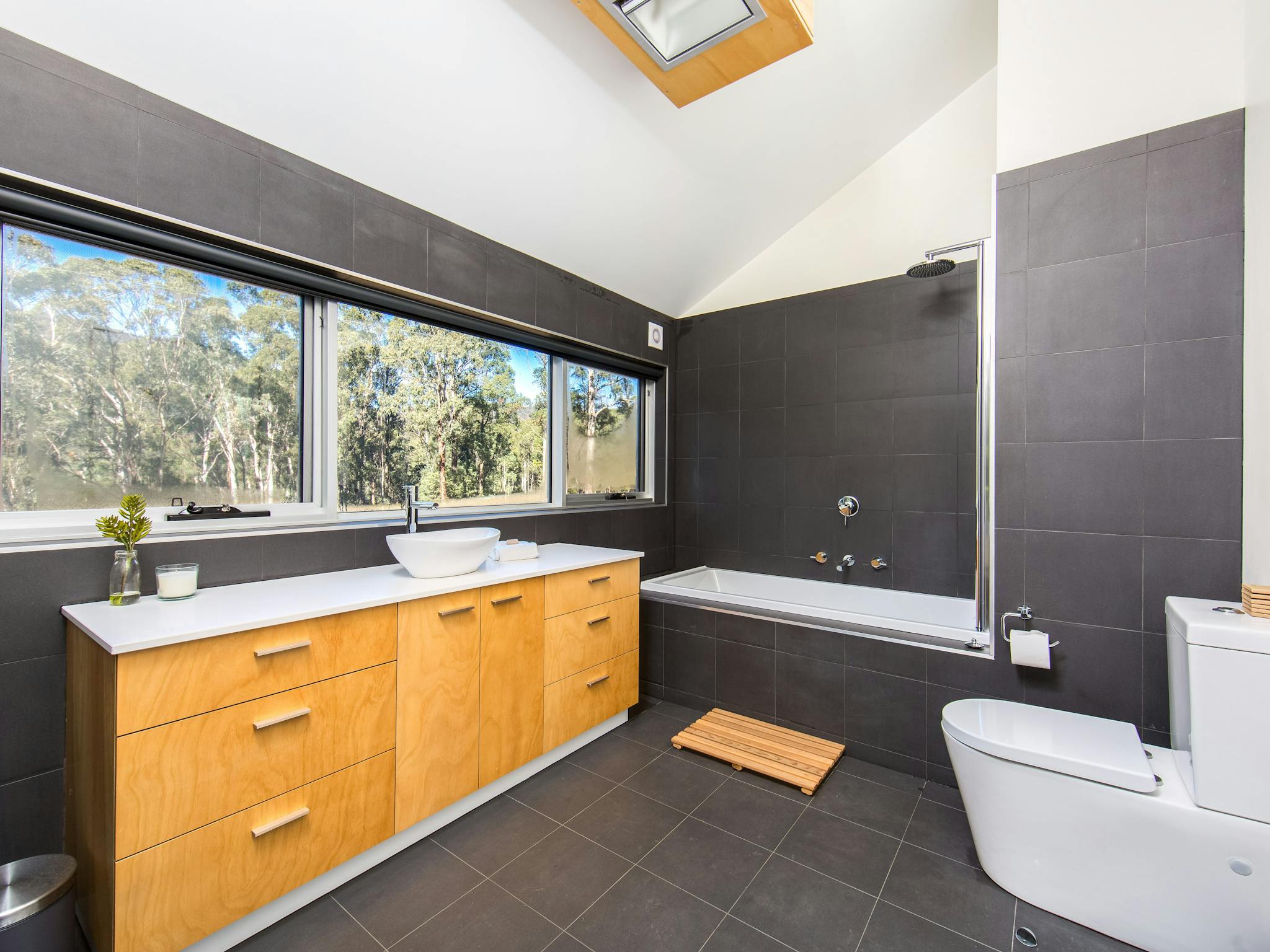 Main bathroom with custom made cabinets