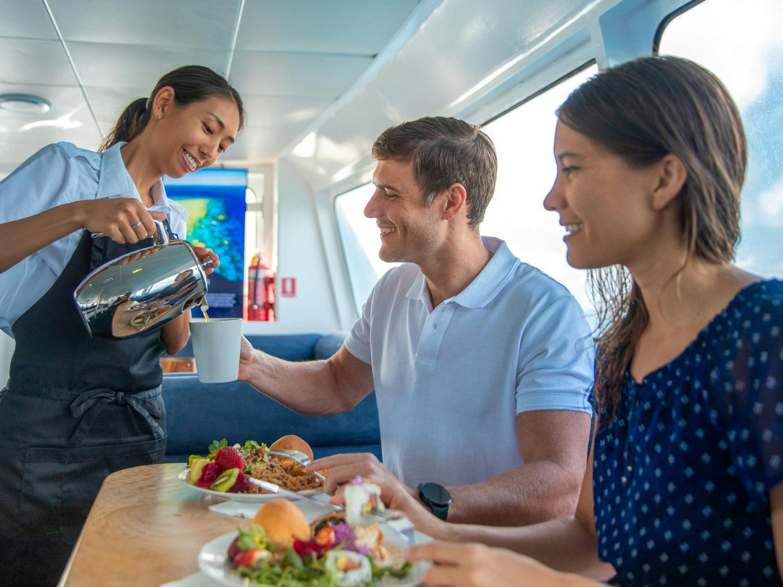 Our in-house chefs crafting delicious meals using locally sourced ingredients