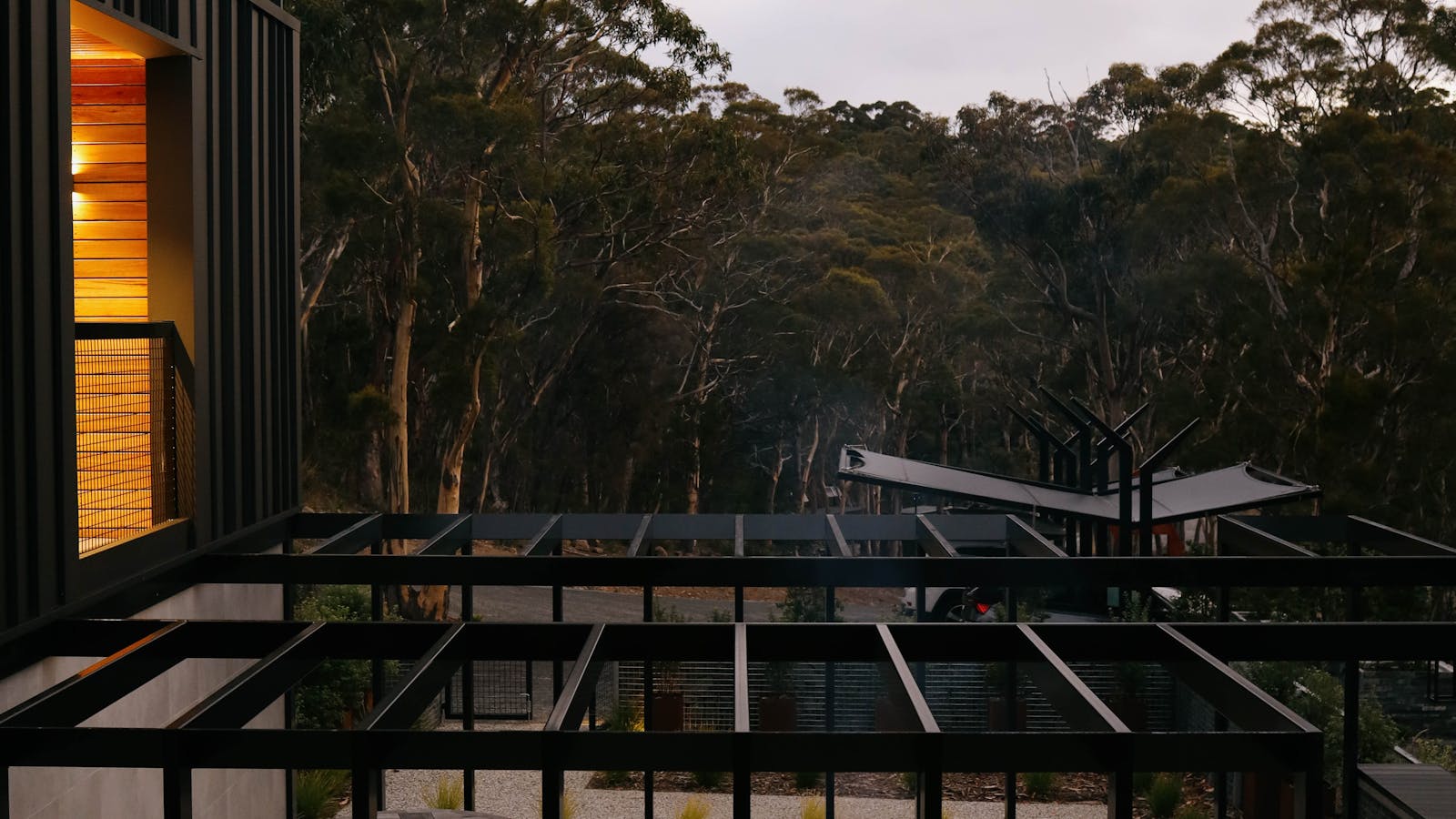 Communal outdoor fire pit with seating, perfect for evening gatherings at Boxwood.