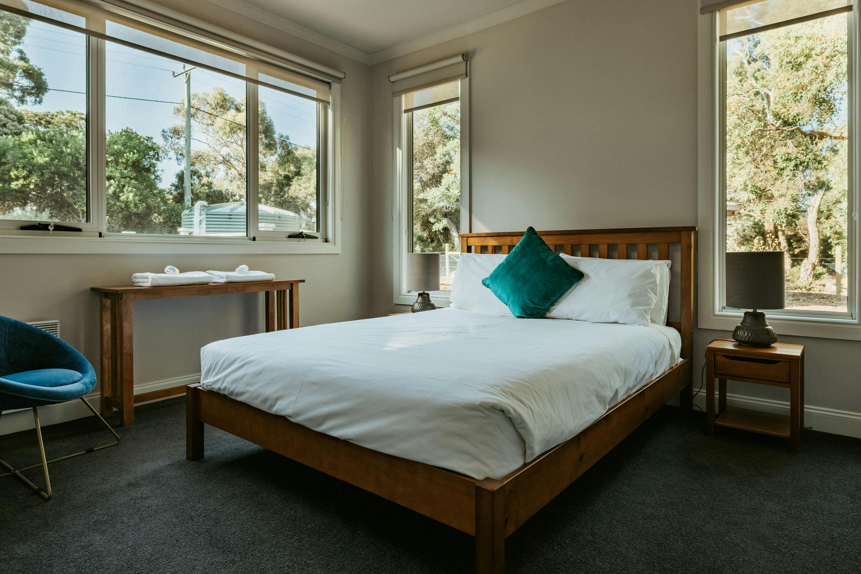 Enjoy a restful night in the queen-sized bed, complemented by efficient panel heating .