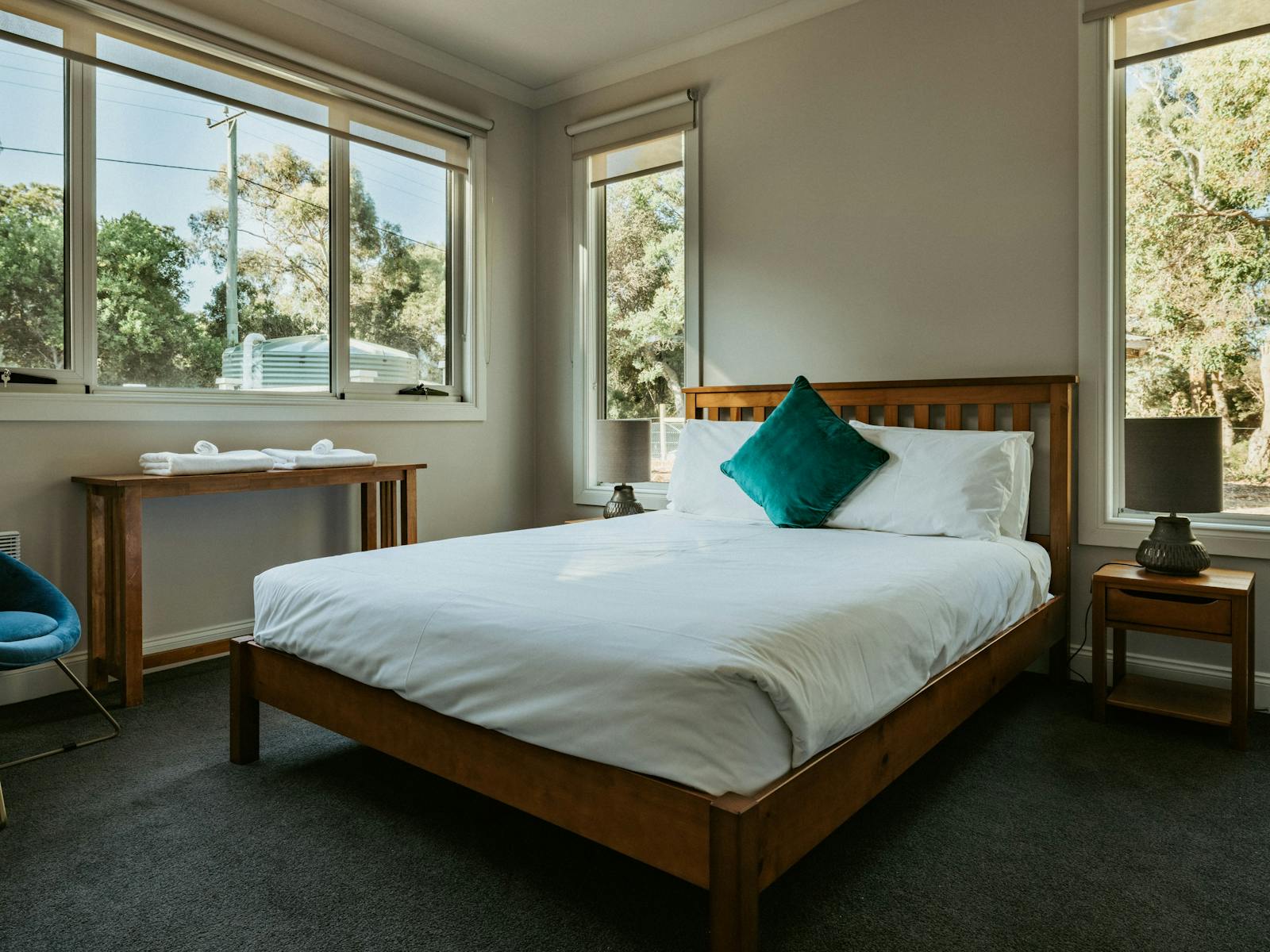 Enjoy a restful night in the queen-sized bed, complemented by efficient panel heating .