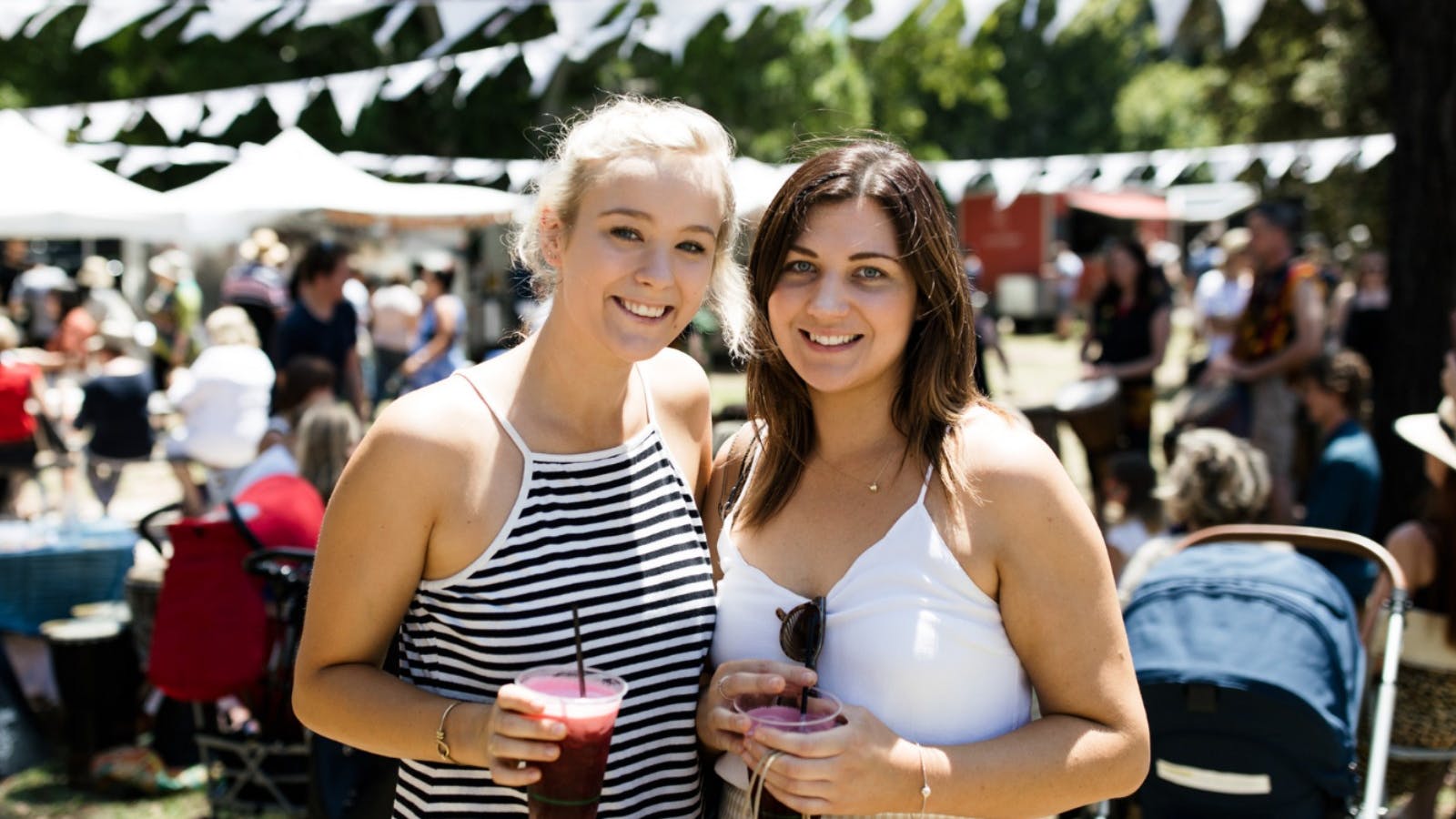 Pick up delicious food & drink from The Olive Tree Market's street food stalls