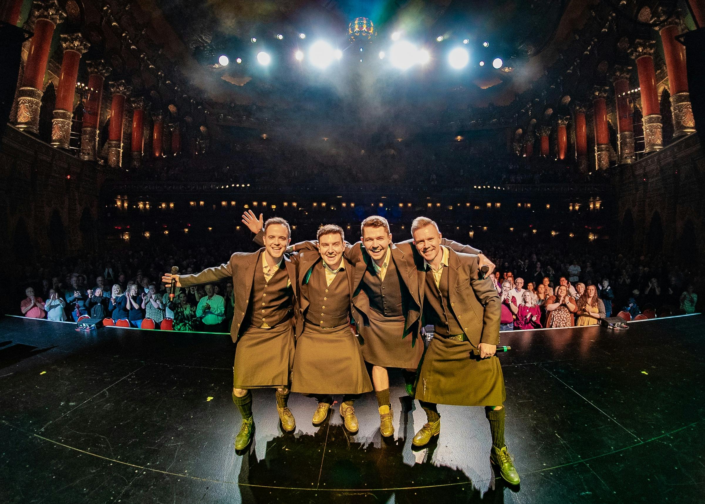 Celtic Thunder smiling on stage