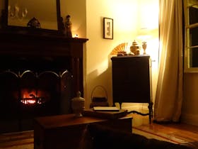 Open fire in guest lounge in winter