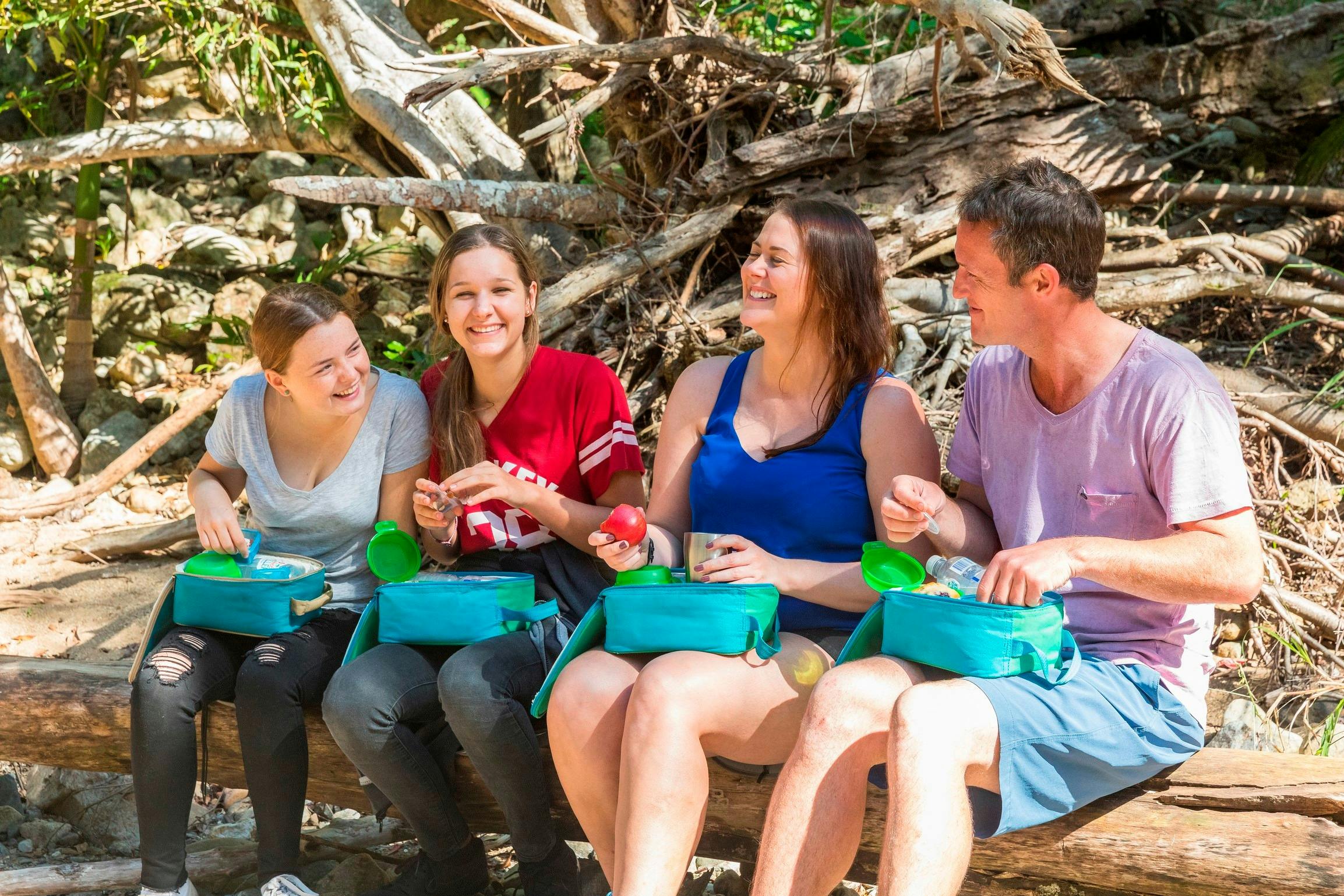 Having morning tea meal on banks of Impulse creek, Conway National Park, Airlie Beach, Whitsundays