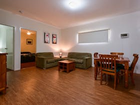 View of the living and dining area in a 2-bedroom cabin