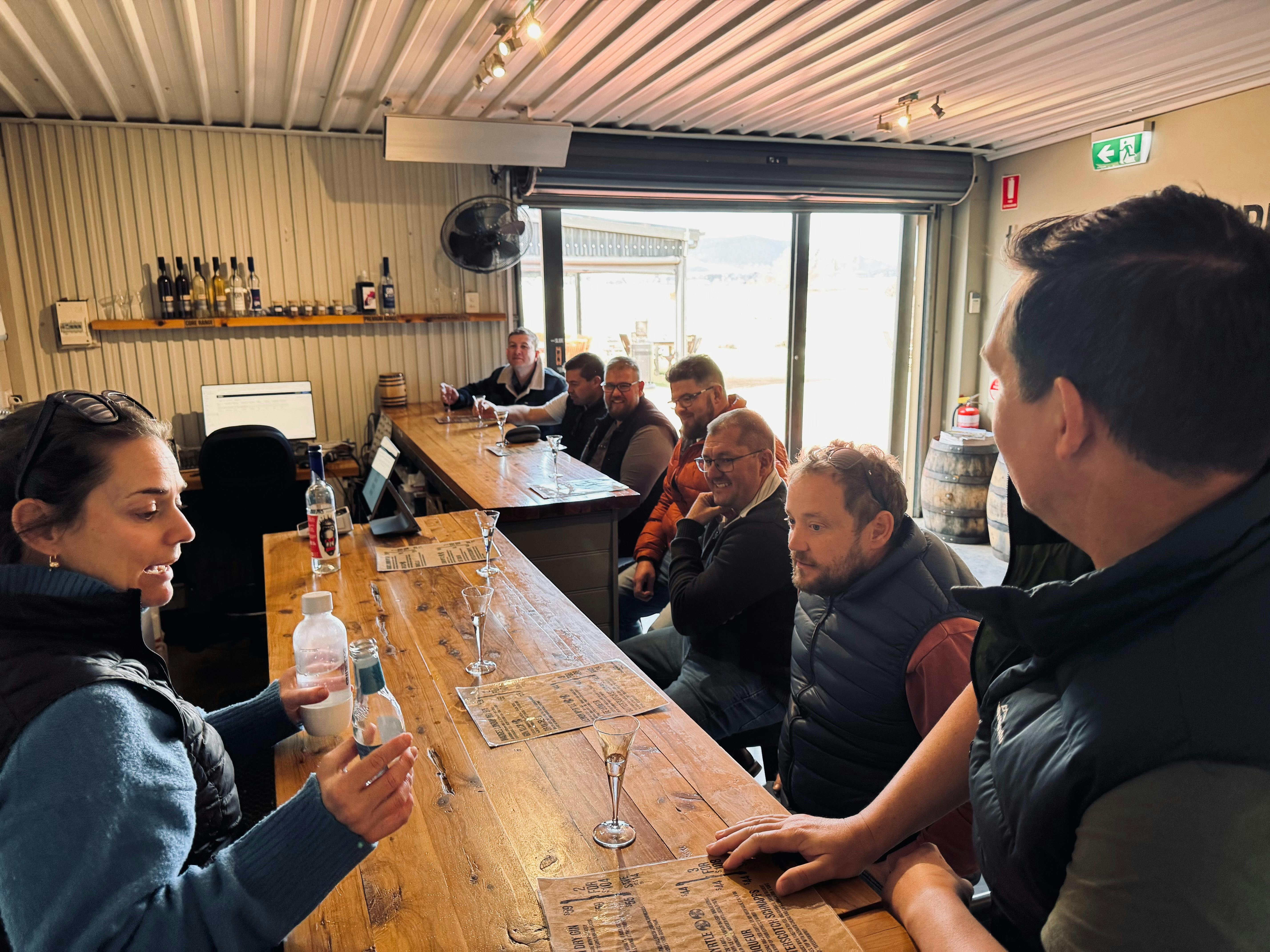 Mudgee Ale trail group at the bar of a distillery
