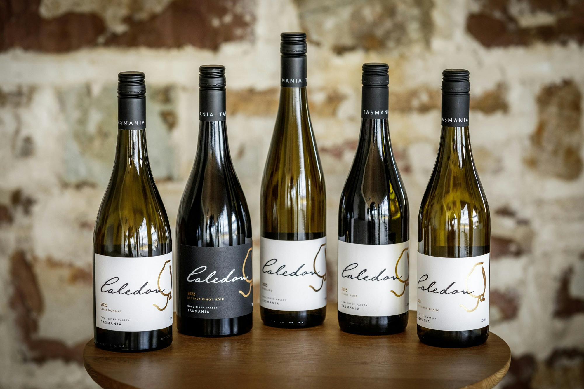 Five bottles of wine from Caledon Estate including Chardonnay and Pinot Noir.