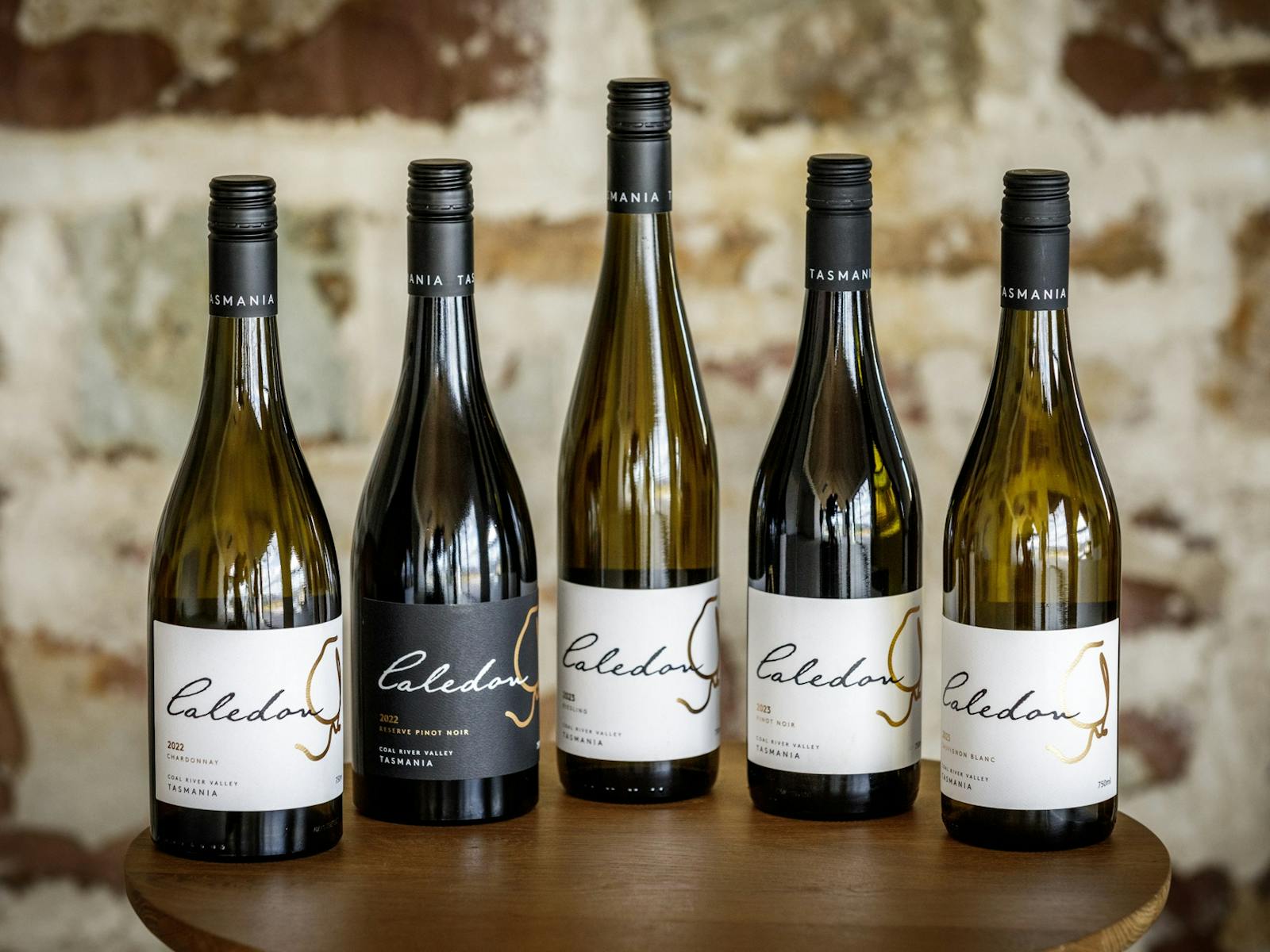 Five bottles of wine from Caledon Estate including Chardonnay and Pinot Noir.