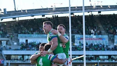 Canberra Raiders players celebrating a try.