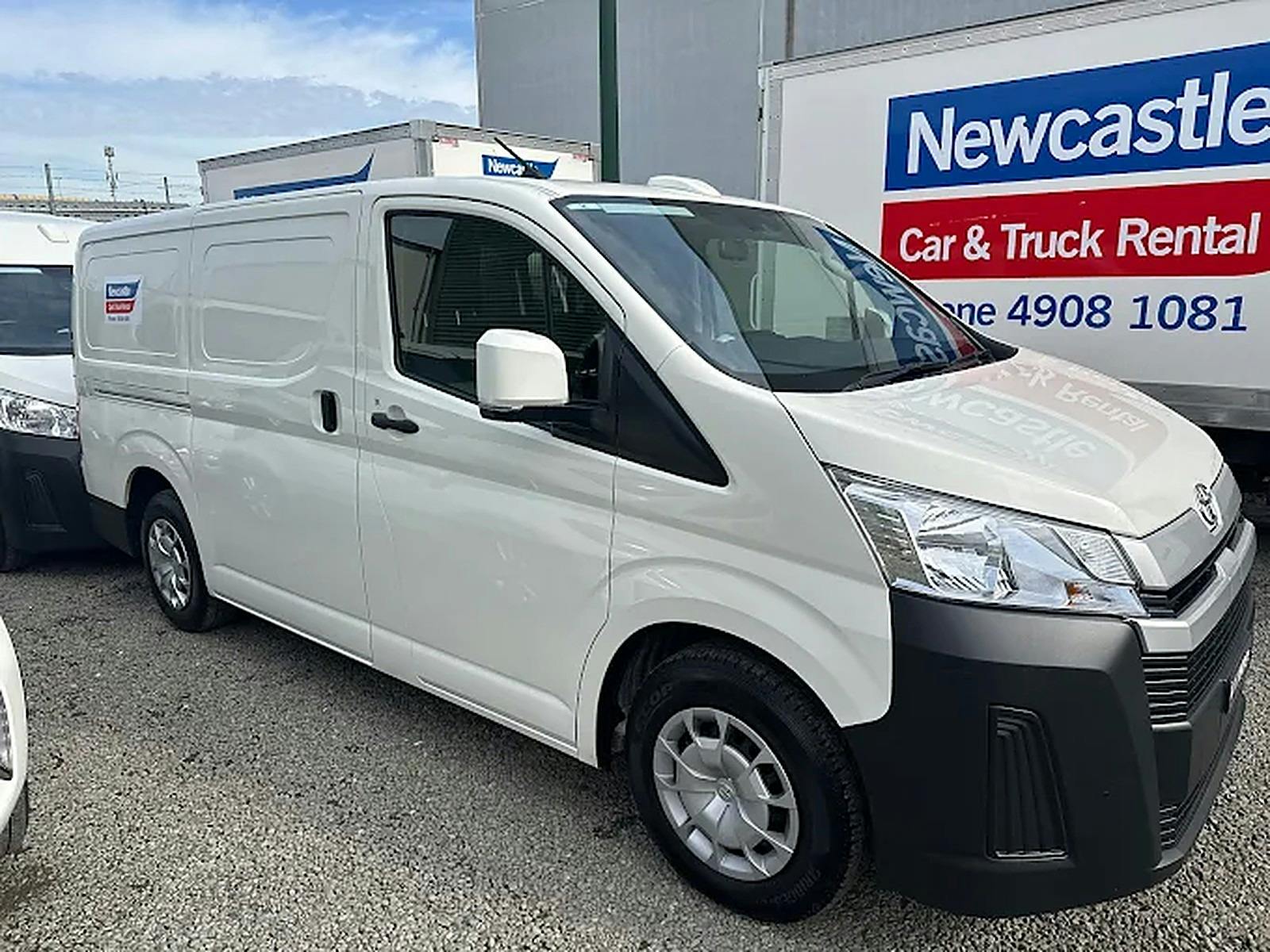 White Toyota HiAce rental van parked at Newcastle Car & Truck Rental