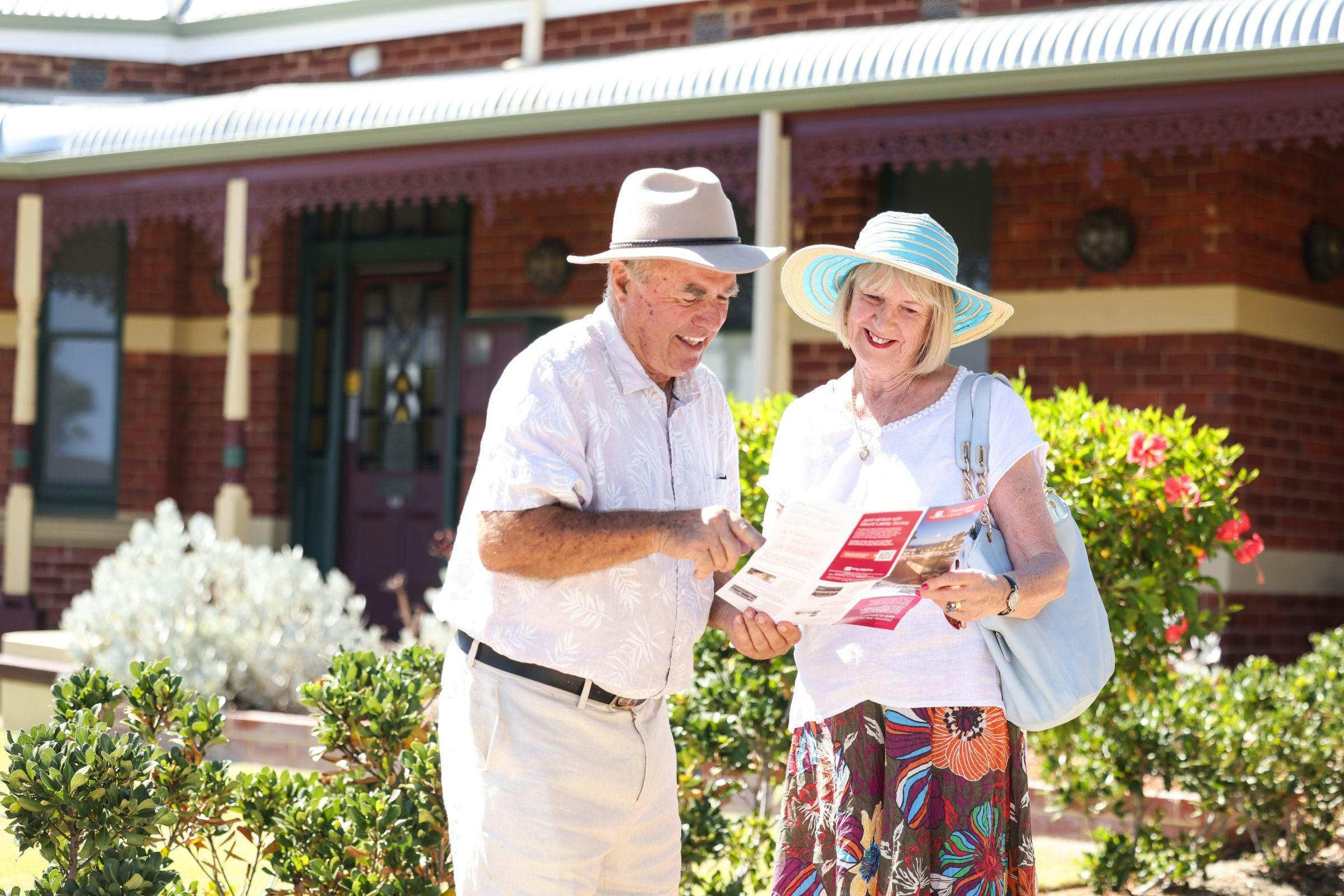 Visitors reading the Mt Lawley Heritage Walk Brochure
