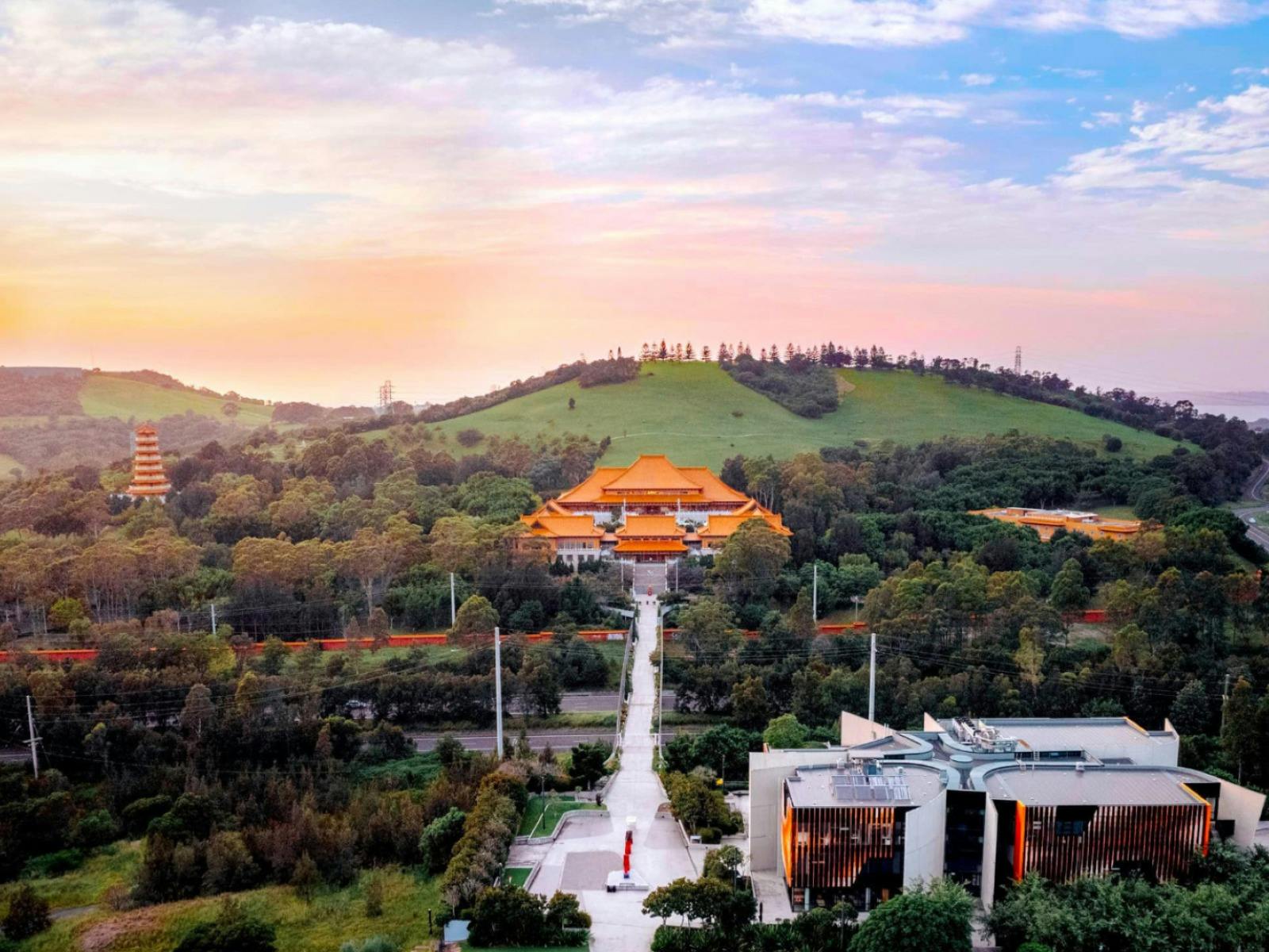 a birds eye view of the temple at sunrise