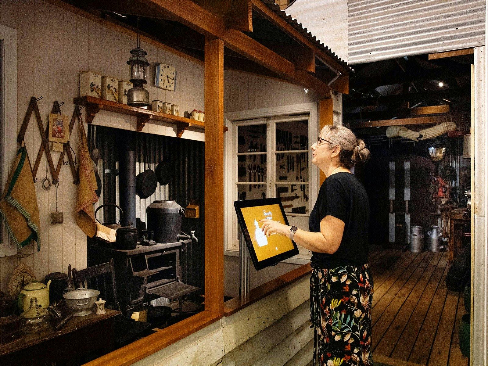 Lady looking at an exhibition display