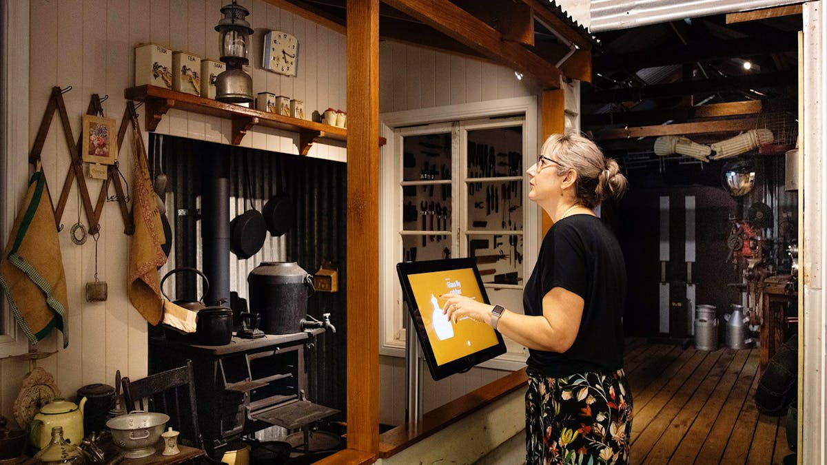Lady looking at an exhibition display